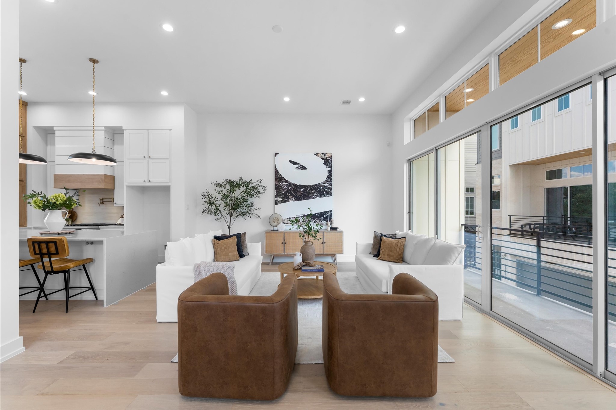 Spacious living area with covered balcony.