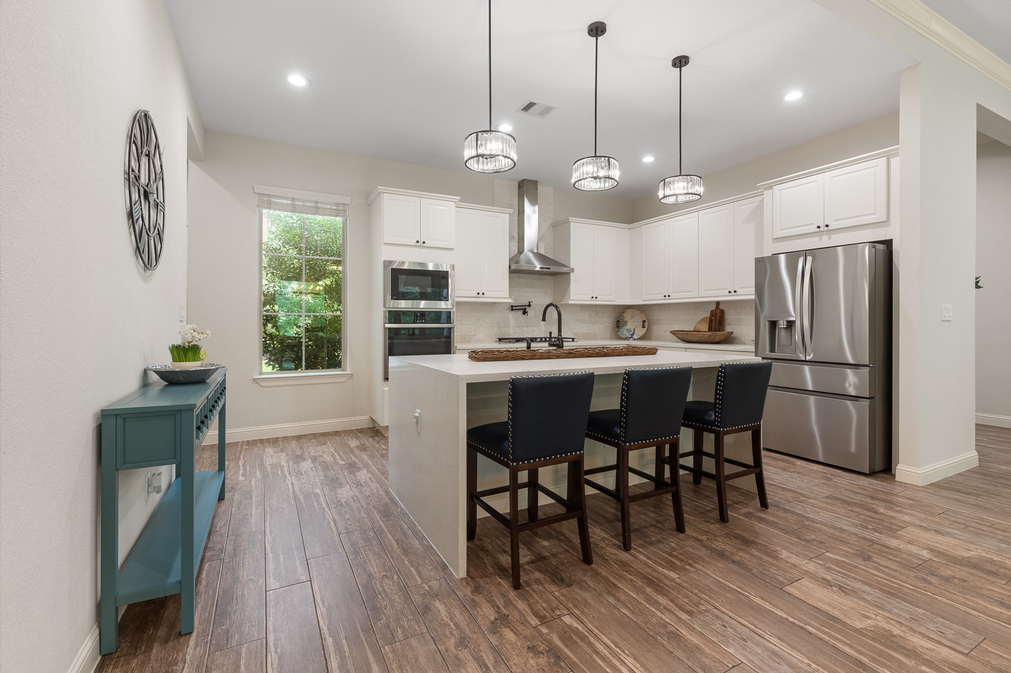 Kitchen with under cabinet lighting and soft close doors and drawers.