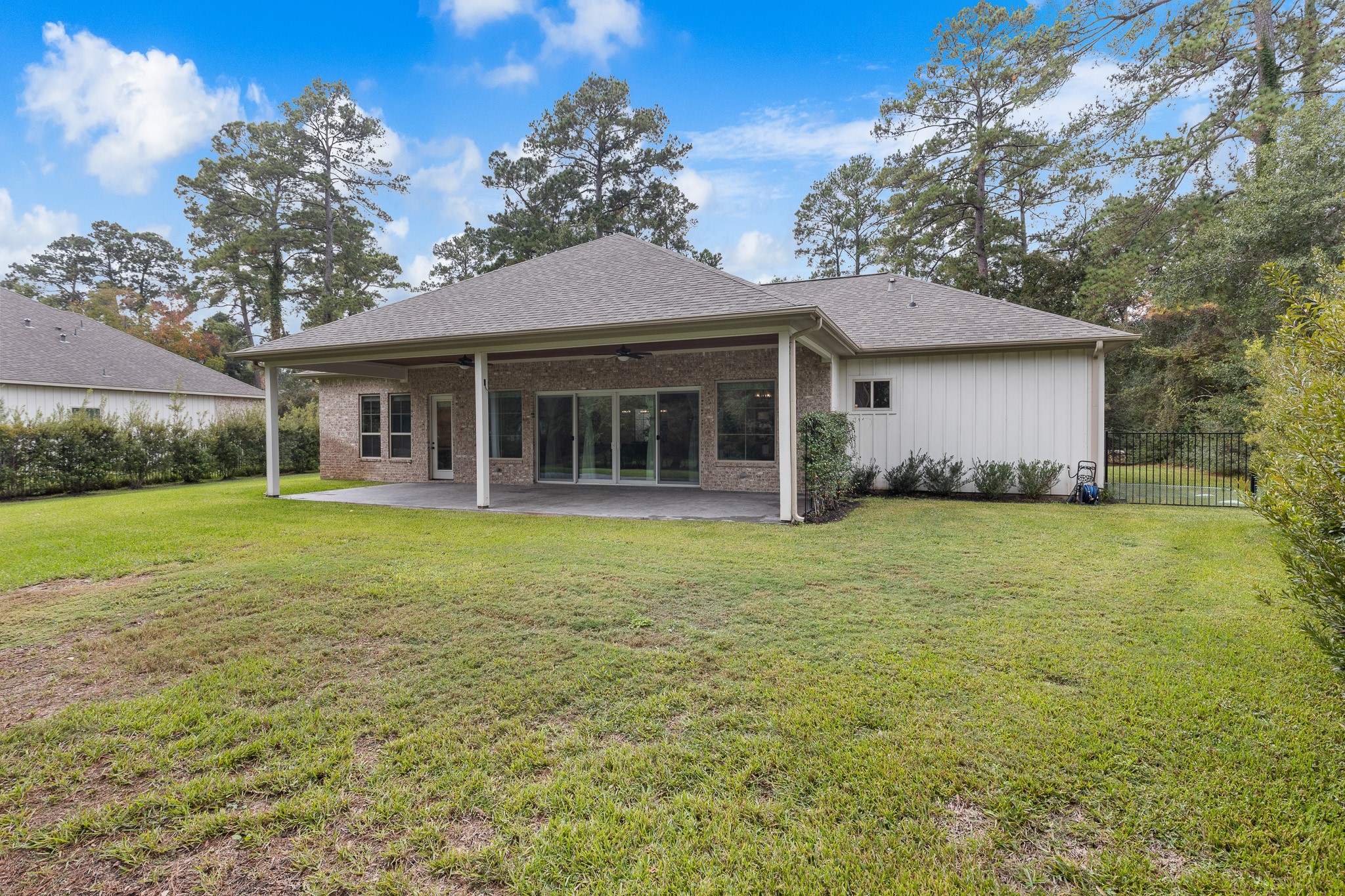 Extensive privacy landscaping, including 32 Wax Myrtle privacy shrubs planted along the back, left and right property lines, each with its own dedicated irrigation zone. This enhancement provides natural screening, increased privacy and a lush green backdrop year-round.