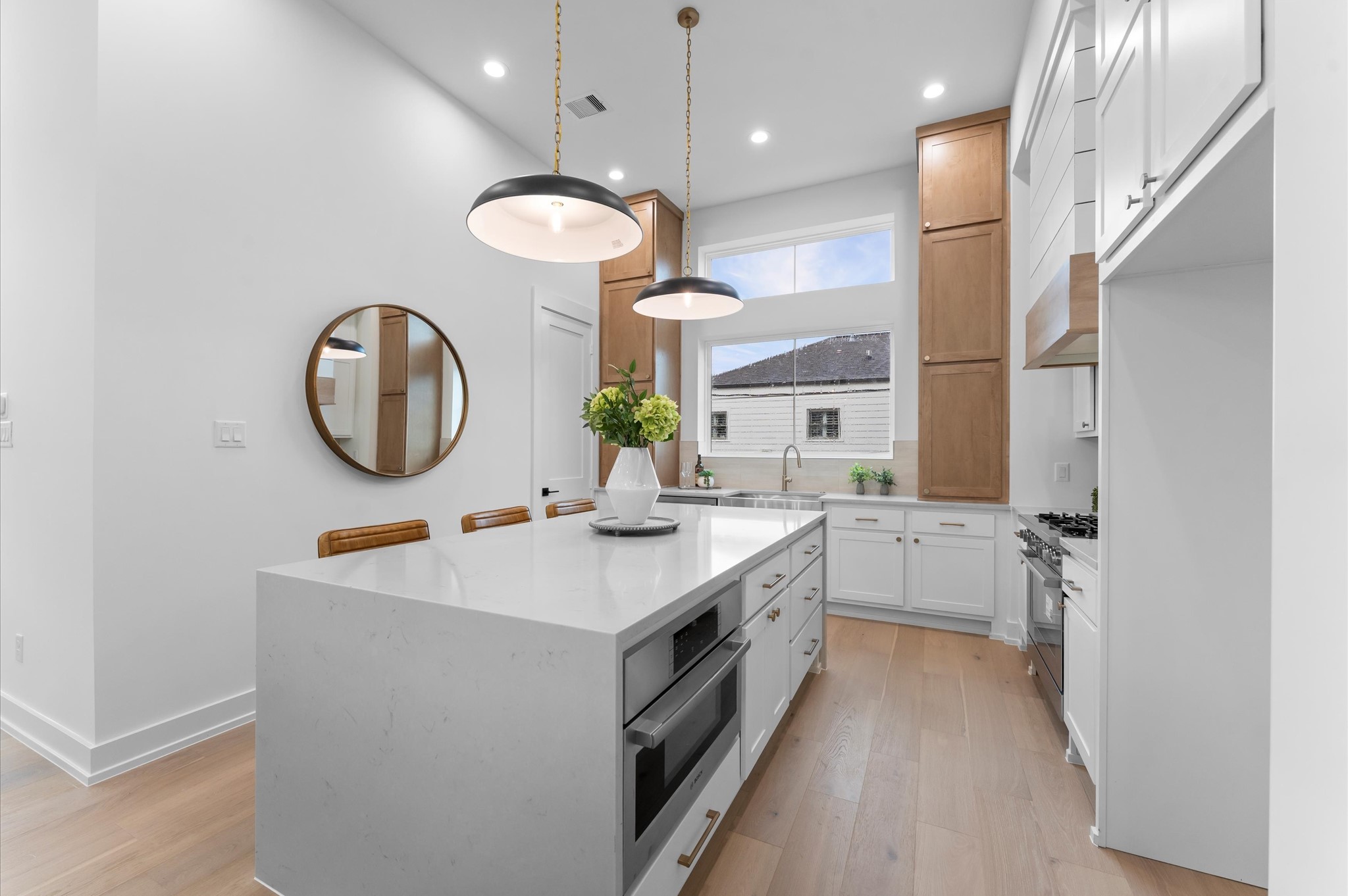Chef's kitchen featuring large island.