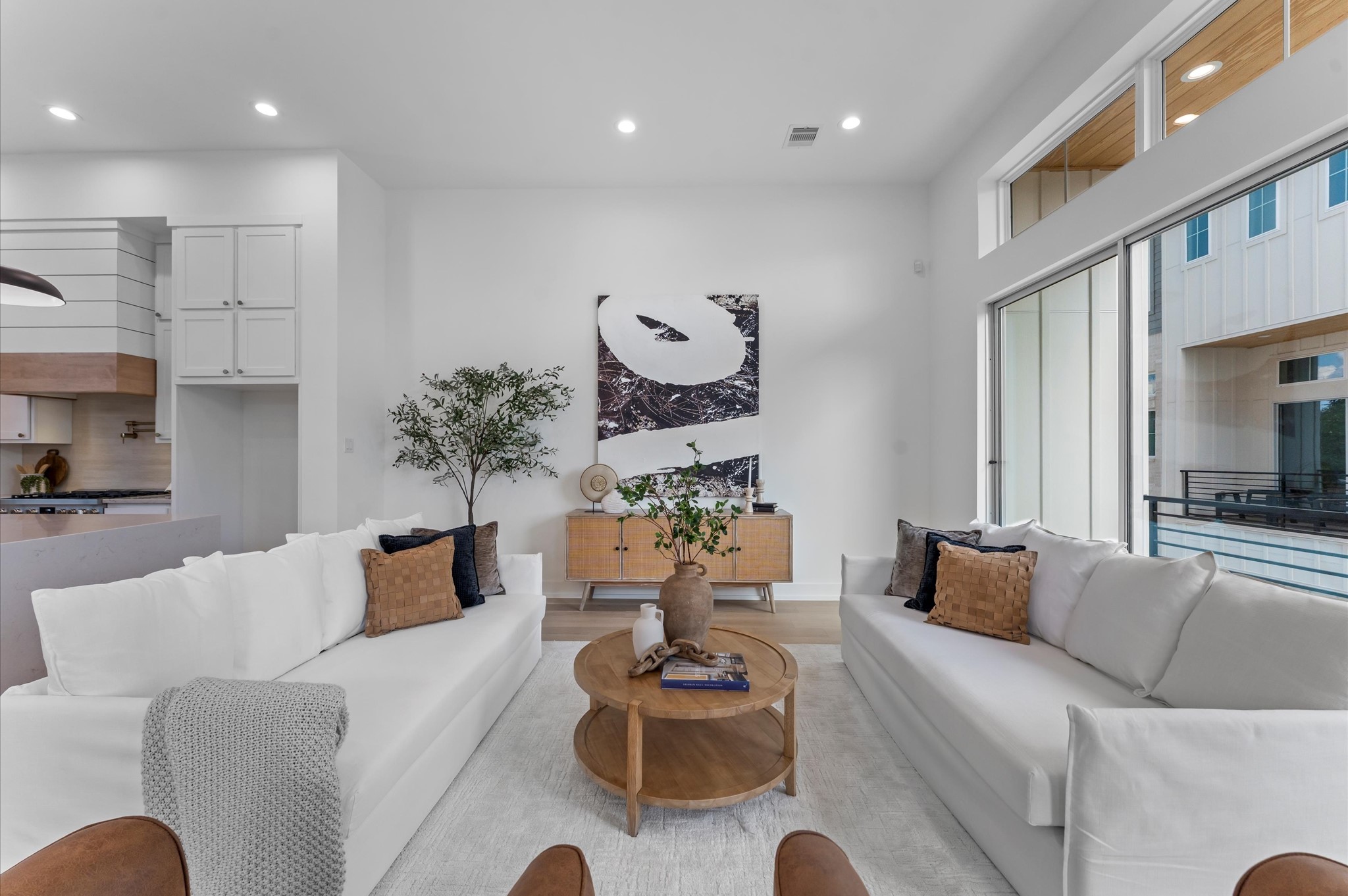 Covered balcony off of expansive second floor living room.