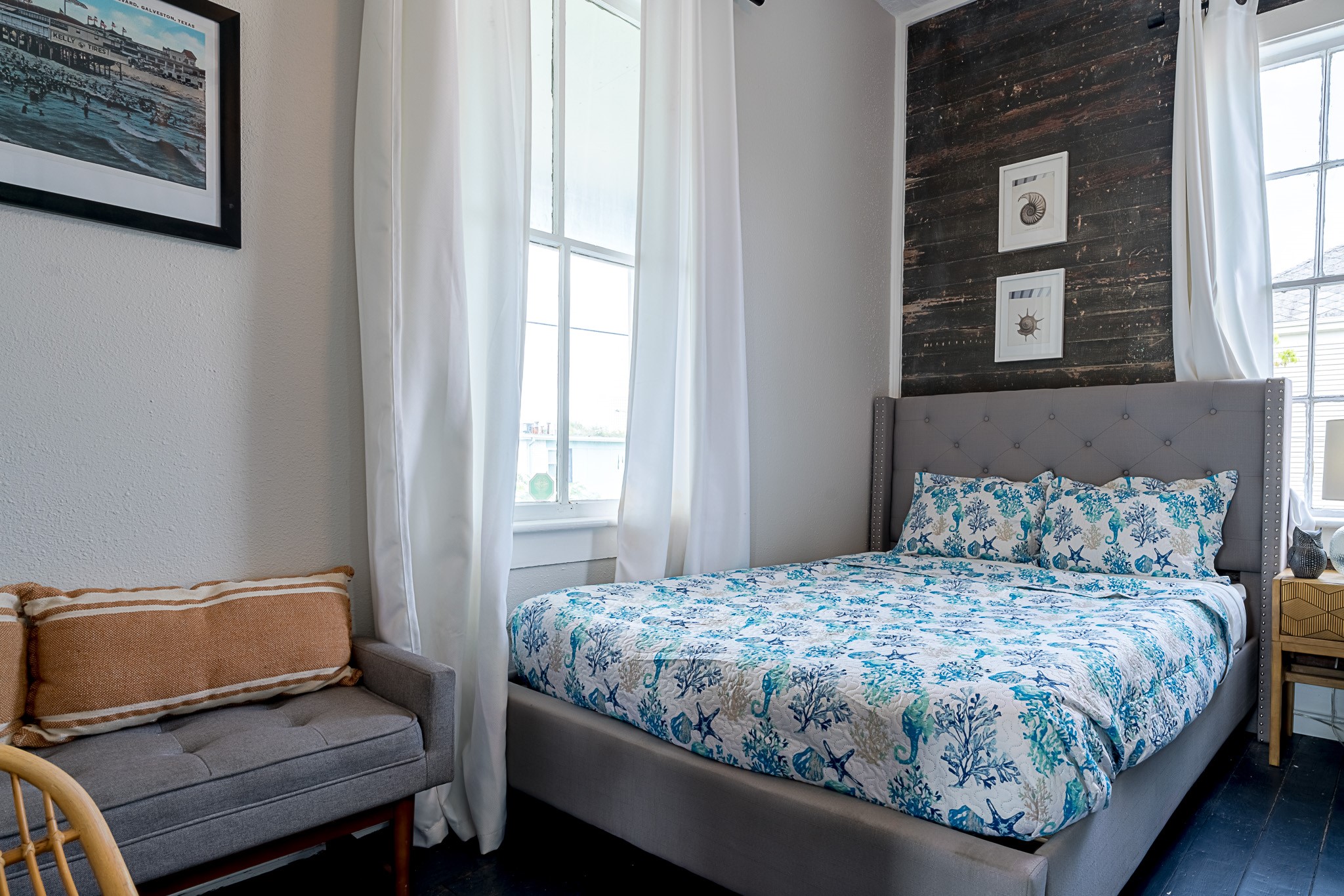 Bedroom one on the second floor, features two full beds