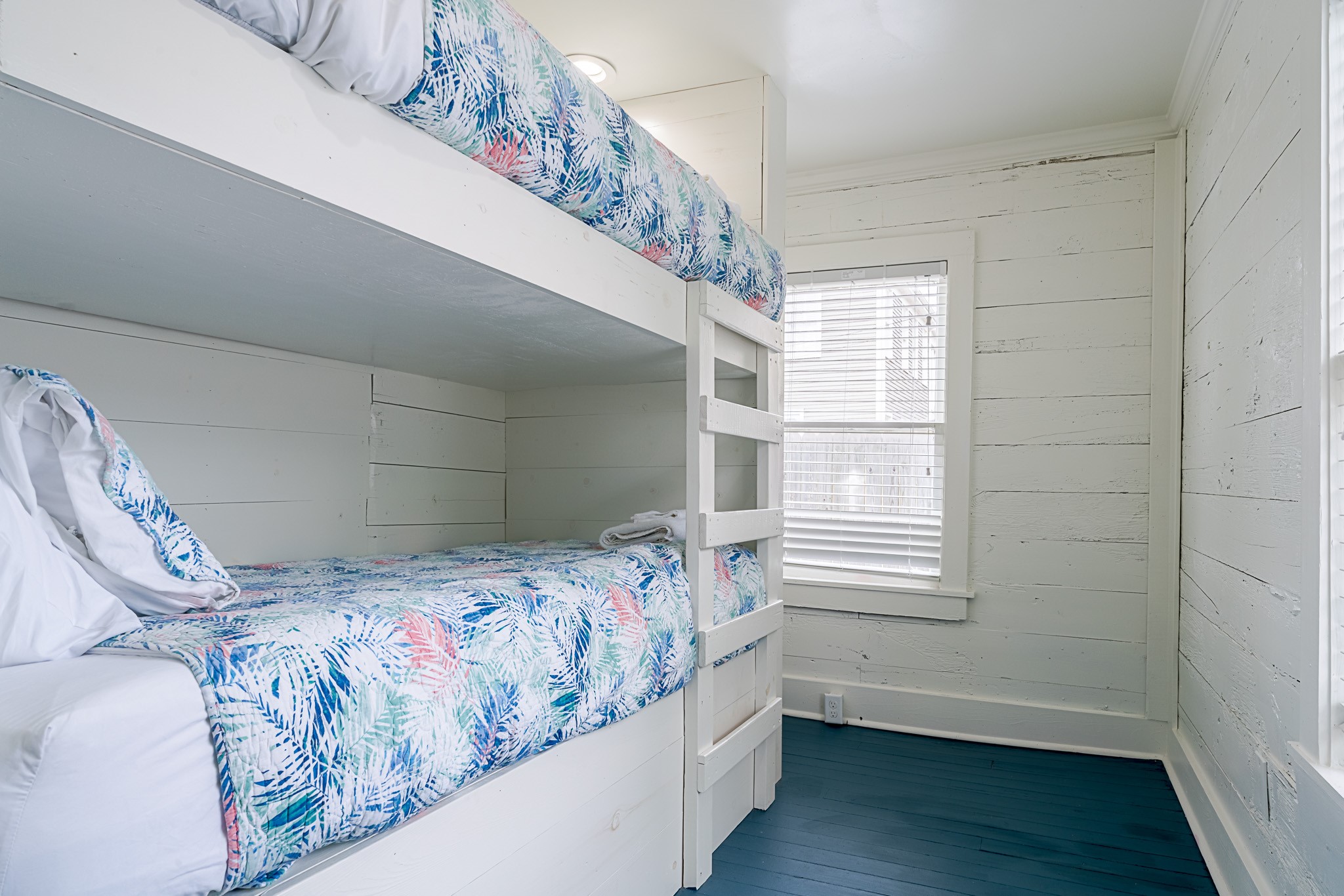 Bedroom four features twin bunk beds
