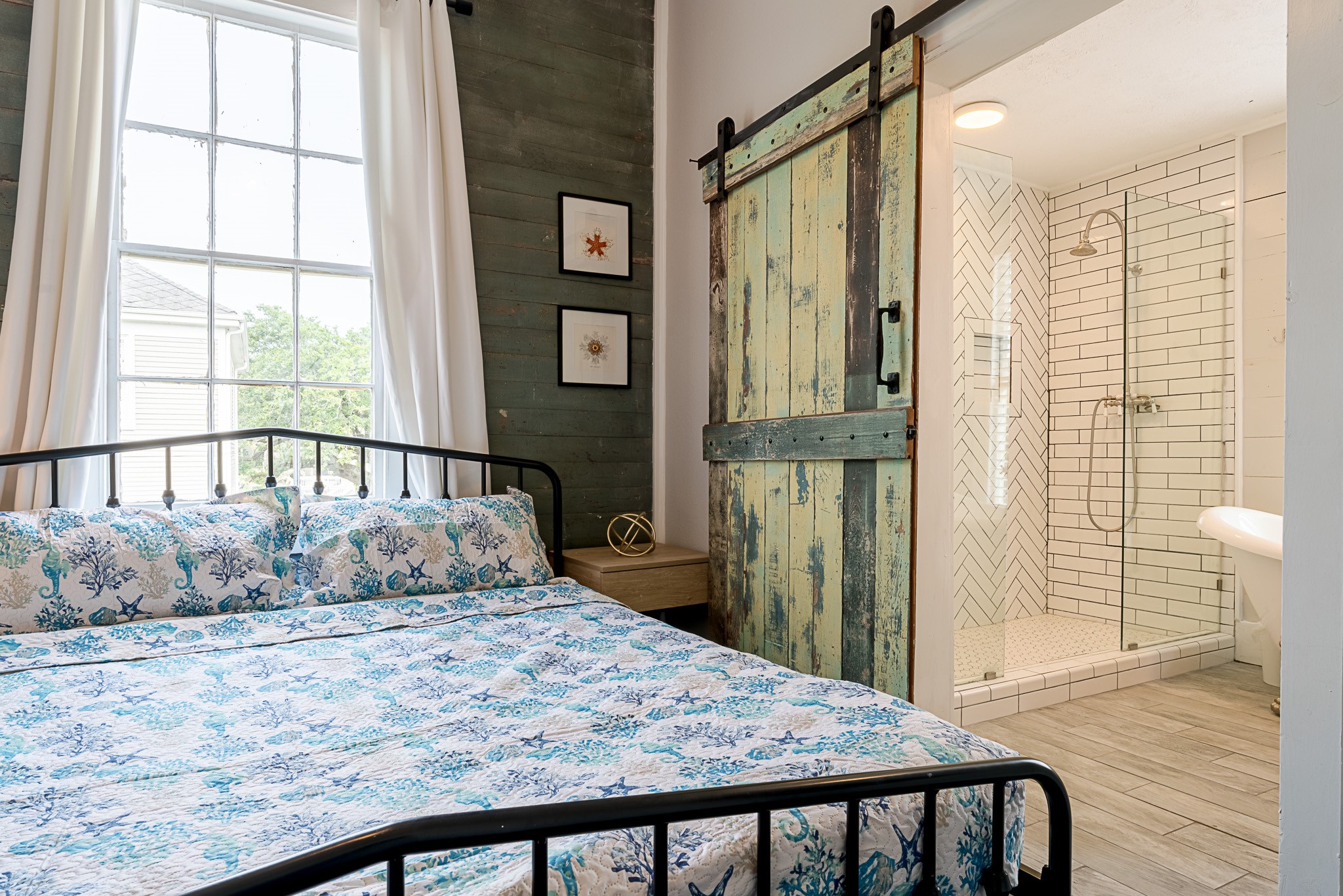 Sliding bard door to primary bathroom