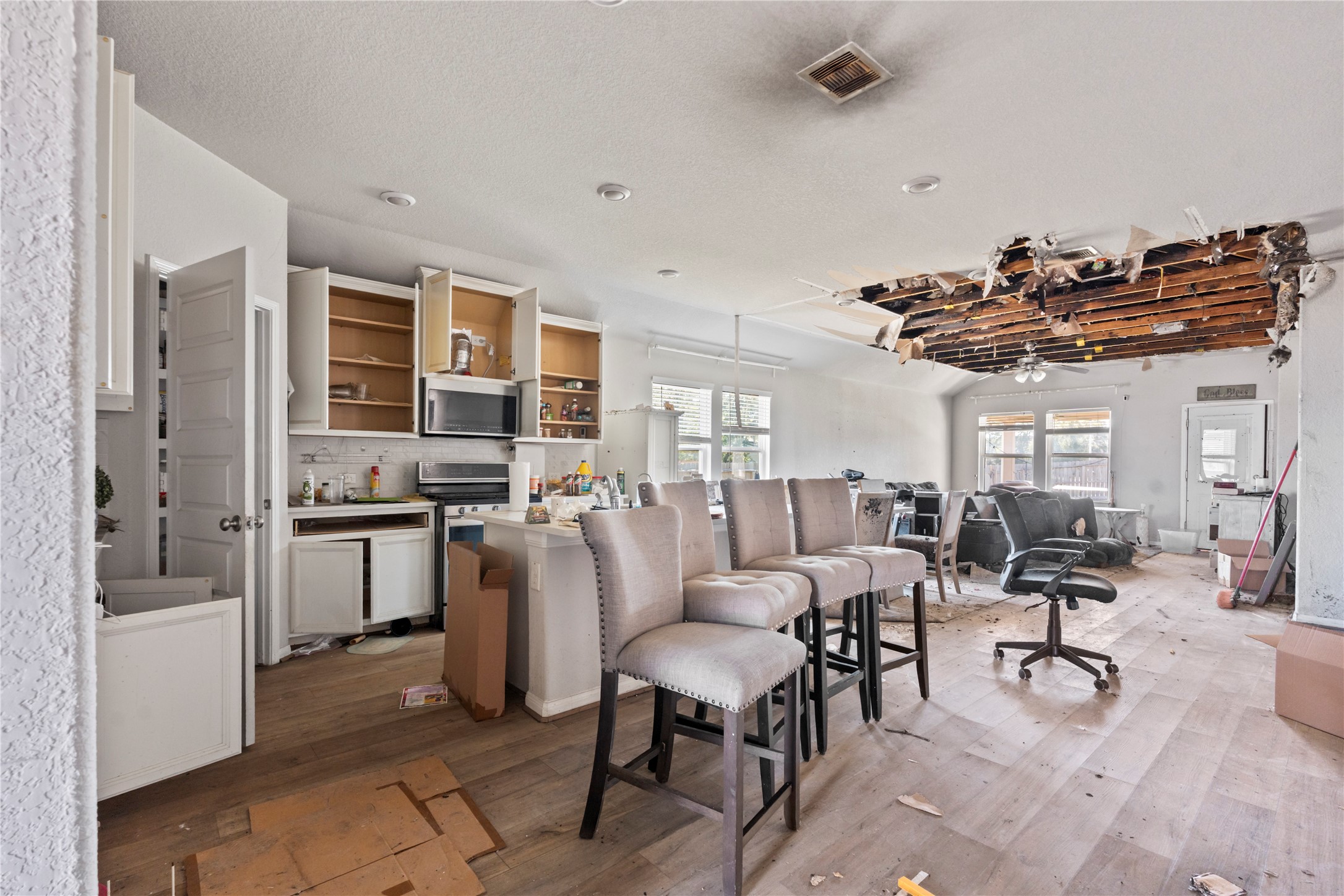 This kitchen and family room can't wait to be renovated and rebuilt.