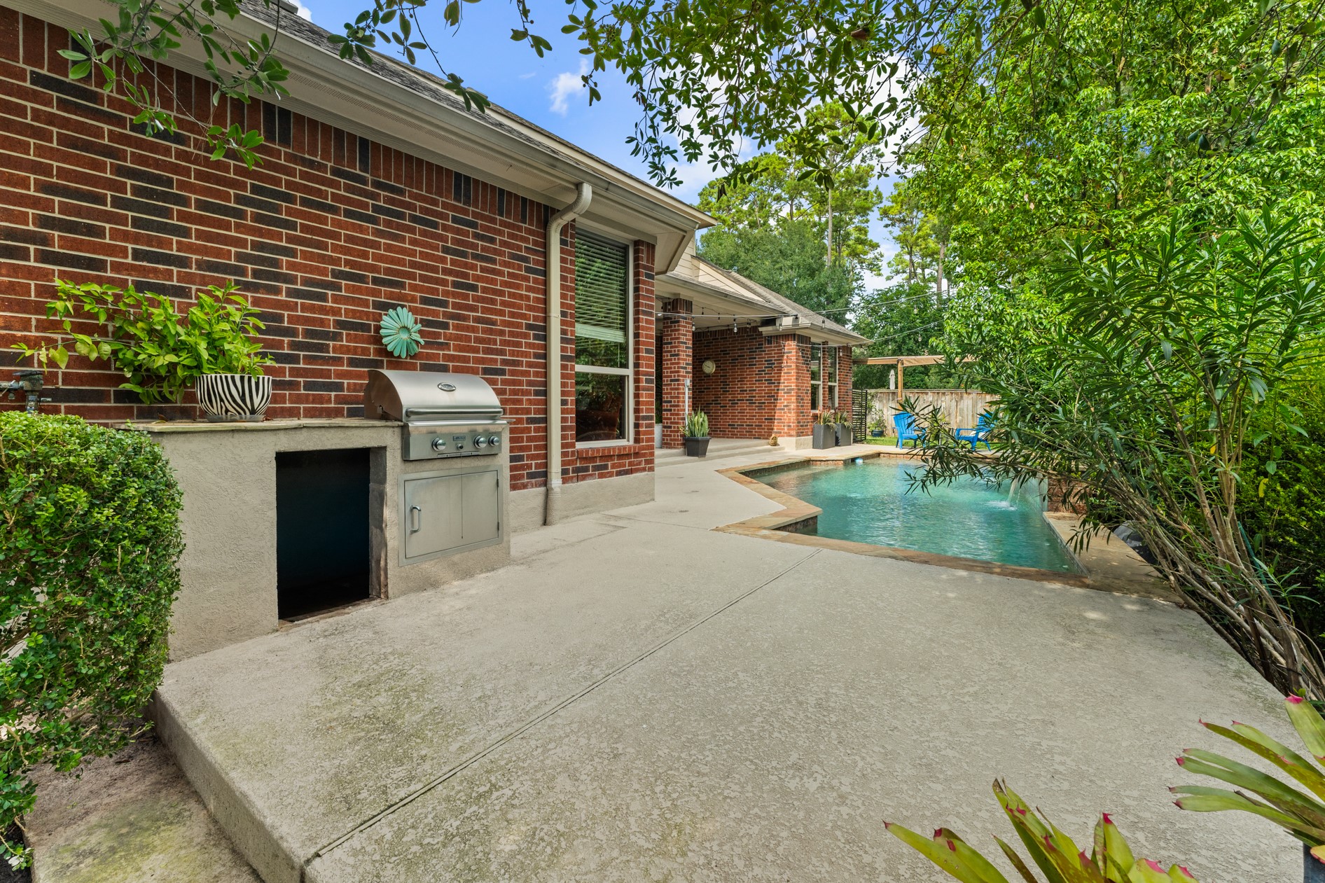 Enjoy grilling your favorites using the built-in grill with an extended stone counter and room for a beverage fridge.
