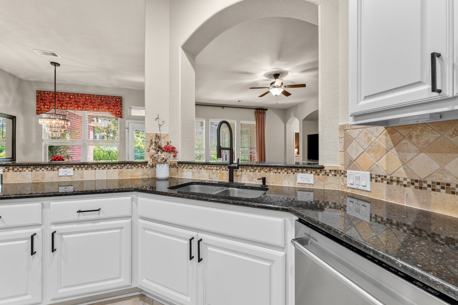 Enjoy sightlines to the other common areas and the pool while in the kitchen.