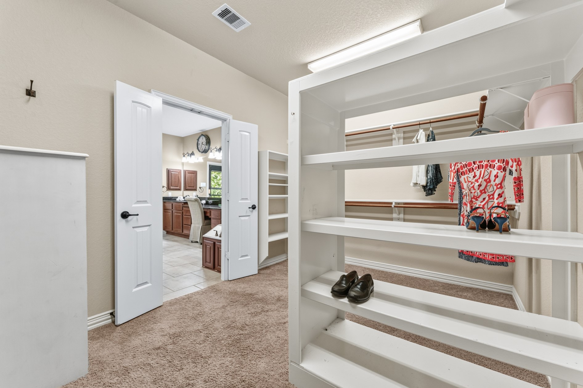 Built-in shelving makes it easy to stay organized.