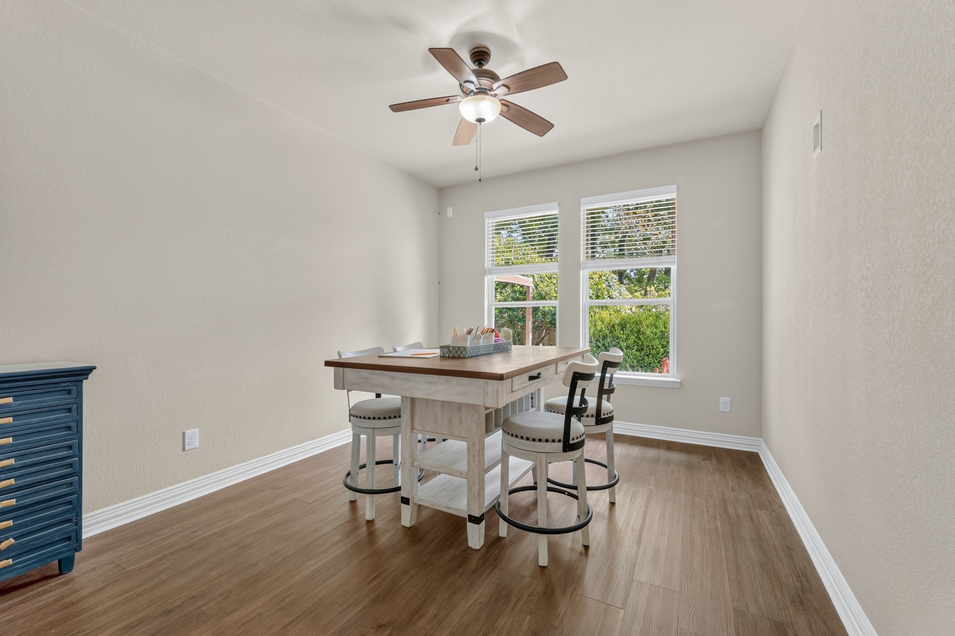 The third guest bedroom has a pretty view of the pool area and mature landscaping in the backyard. It is separated from the other two guest bedrooms and has a full bathroom next to it - perfect for offering more privacy for guests.