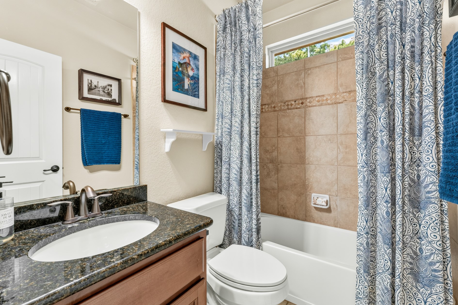 This is the full bathroom located next to the third guest bedroom.