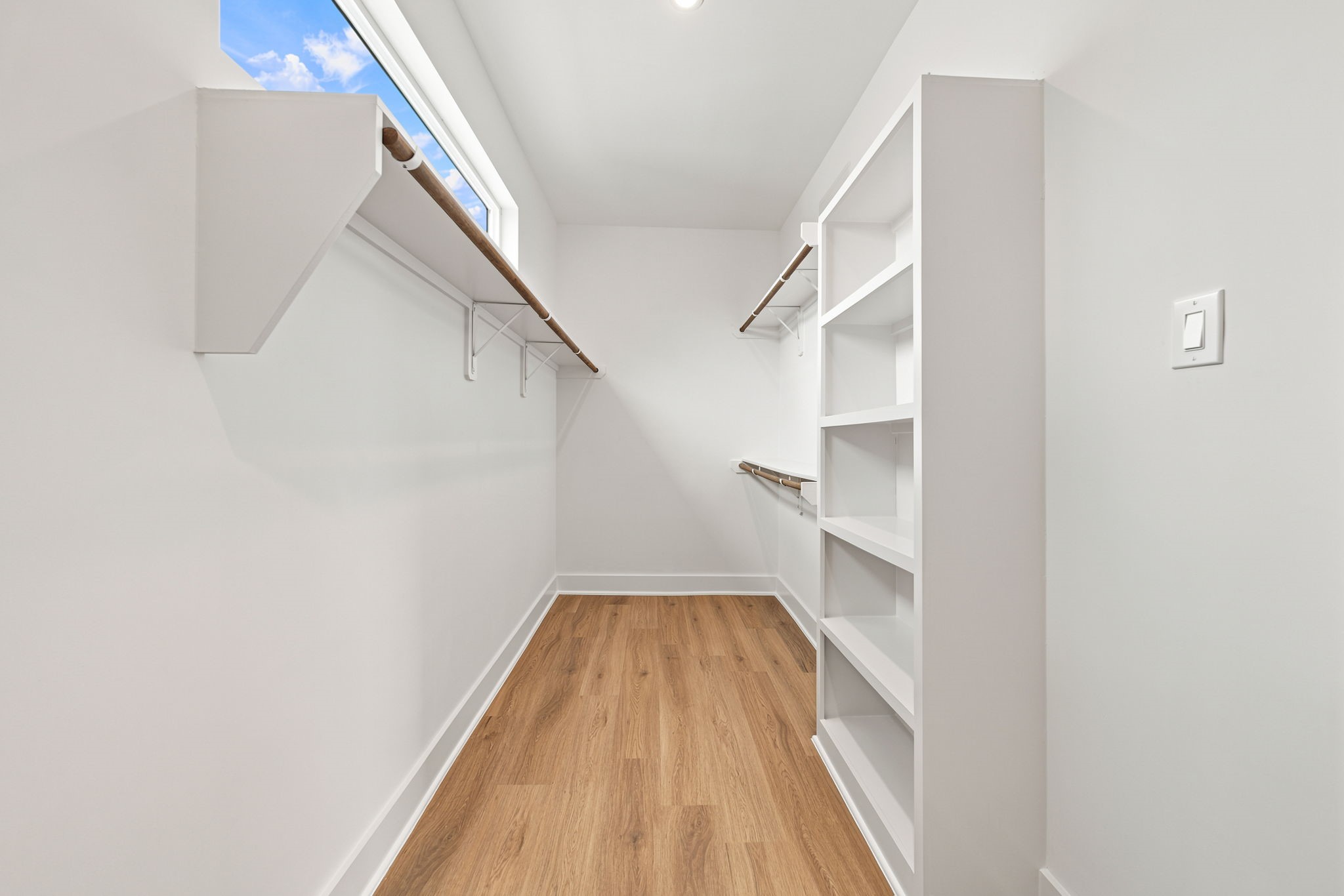 Walk-in closet in your primary bedroom.
