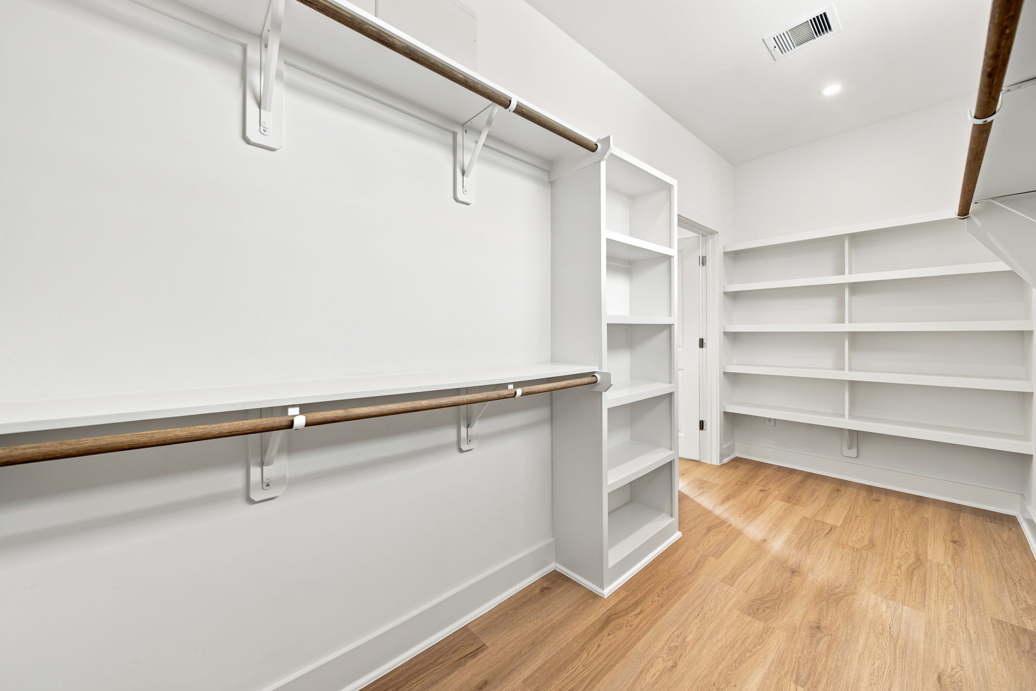 Built-in shelves in your primary closet.