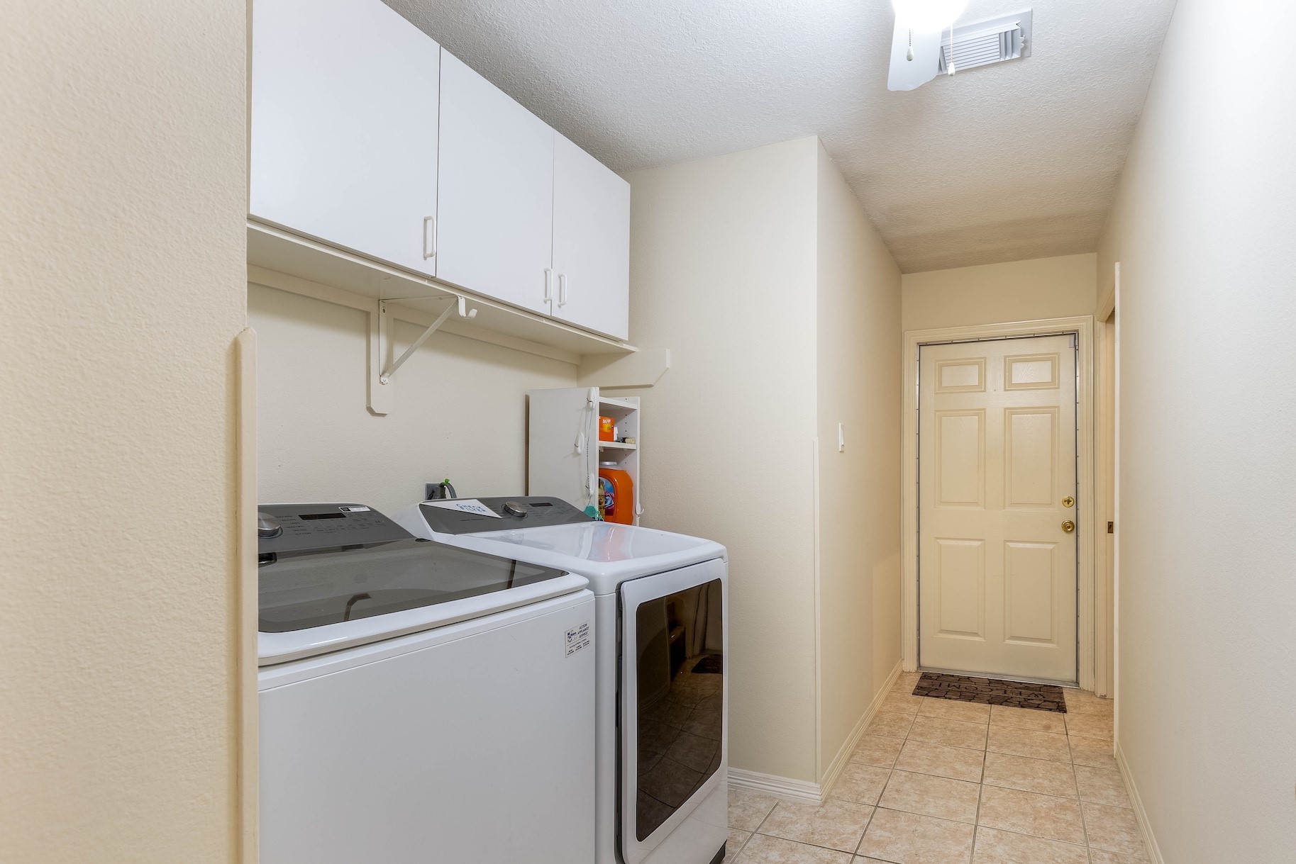 The in-house utility room that has extra storage.