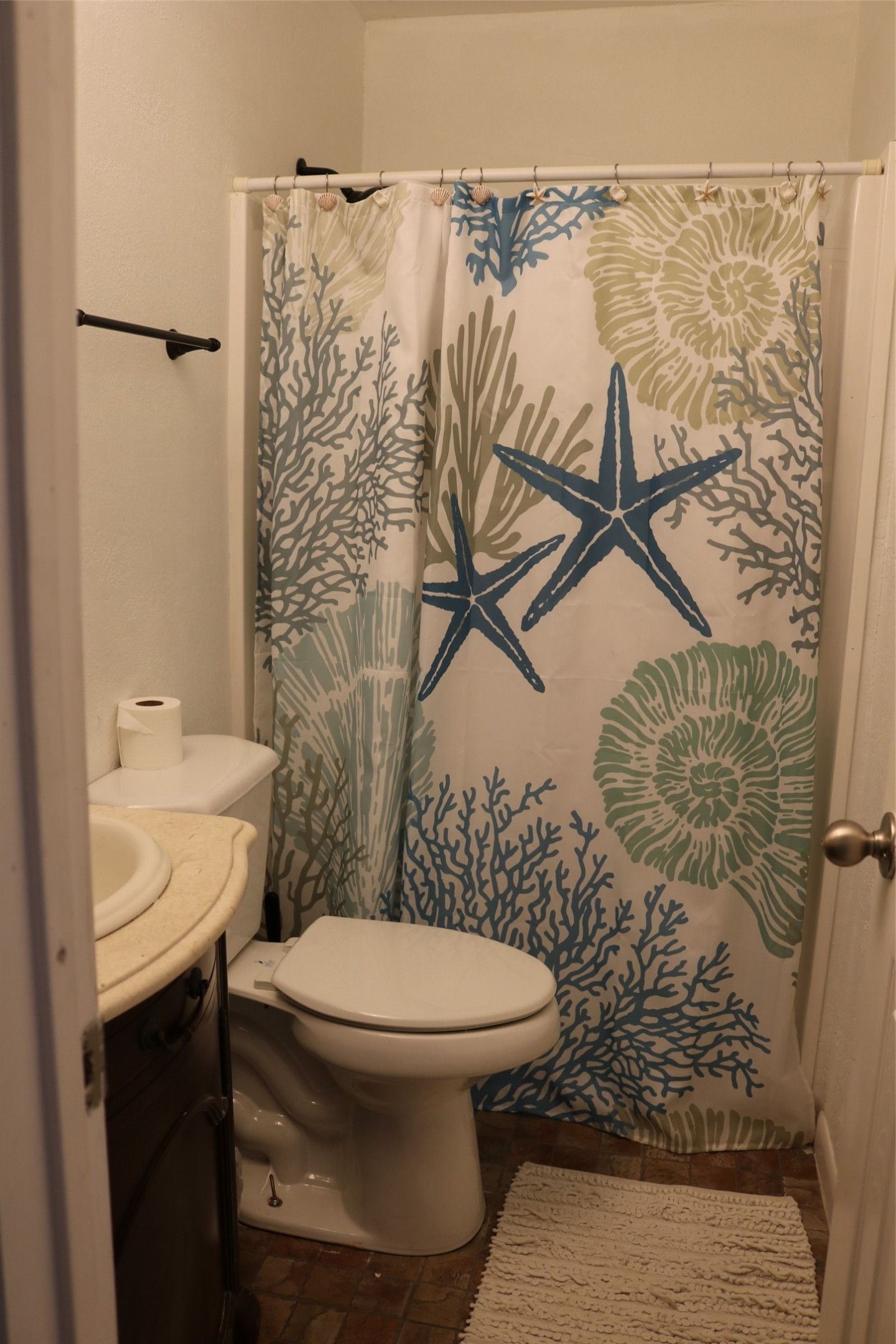 Convenient second-level bathroom serving two bedrooms.