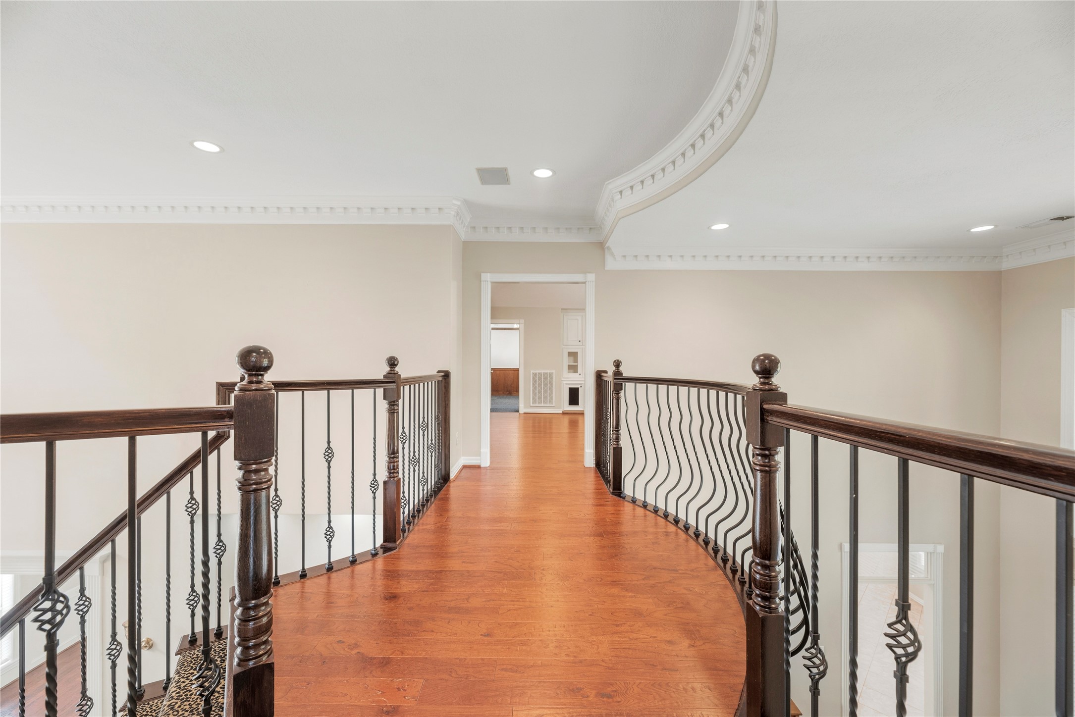 Exquisite crown molding with intricate dentil detailing.
