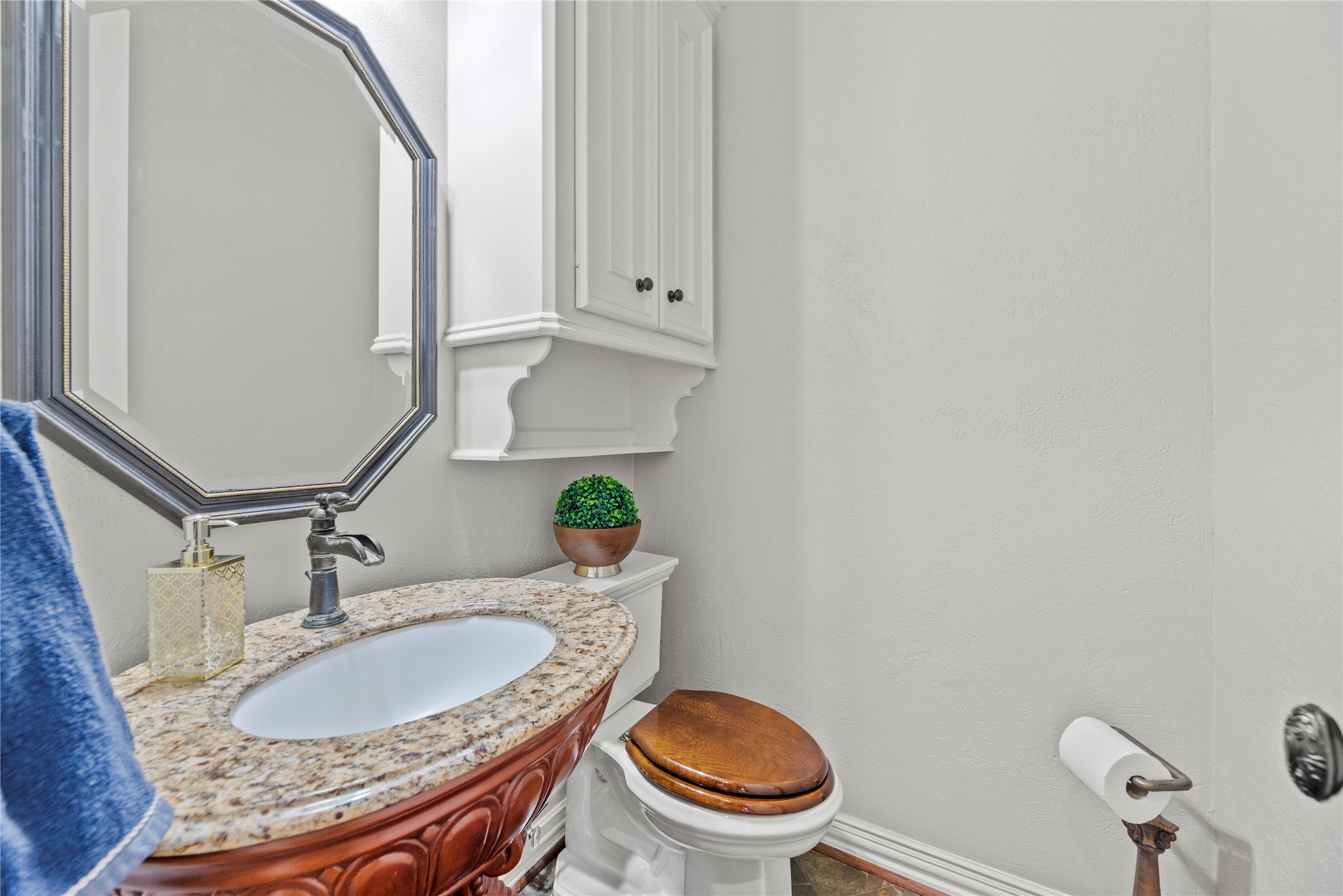 Half bathroom located downstairs.