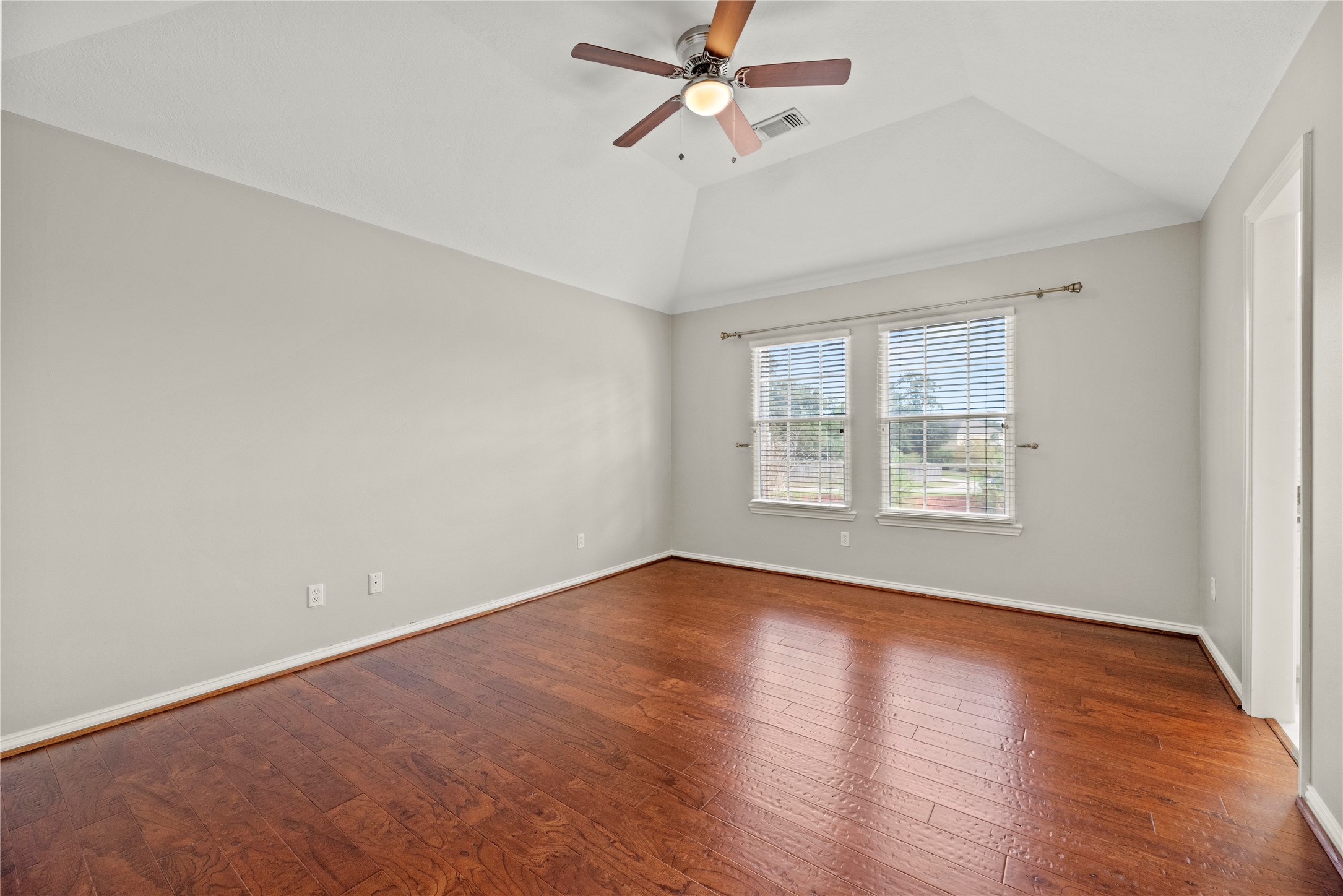 All upstairs bedrooms feature wood flooring, ceiling fans, large closets and have direct access to bathrooms.