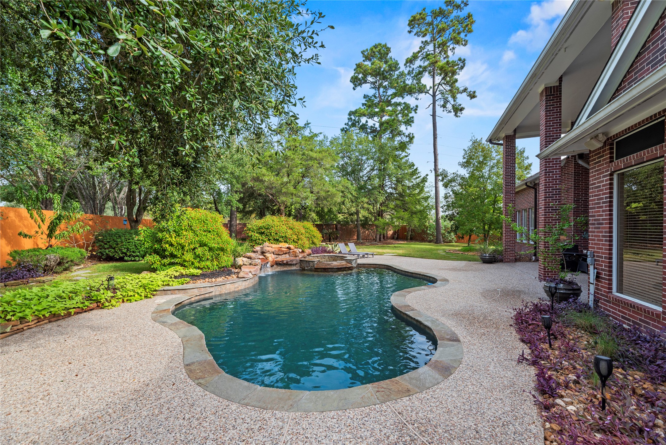 Another view of the pool and backyard.