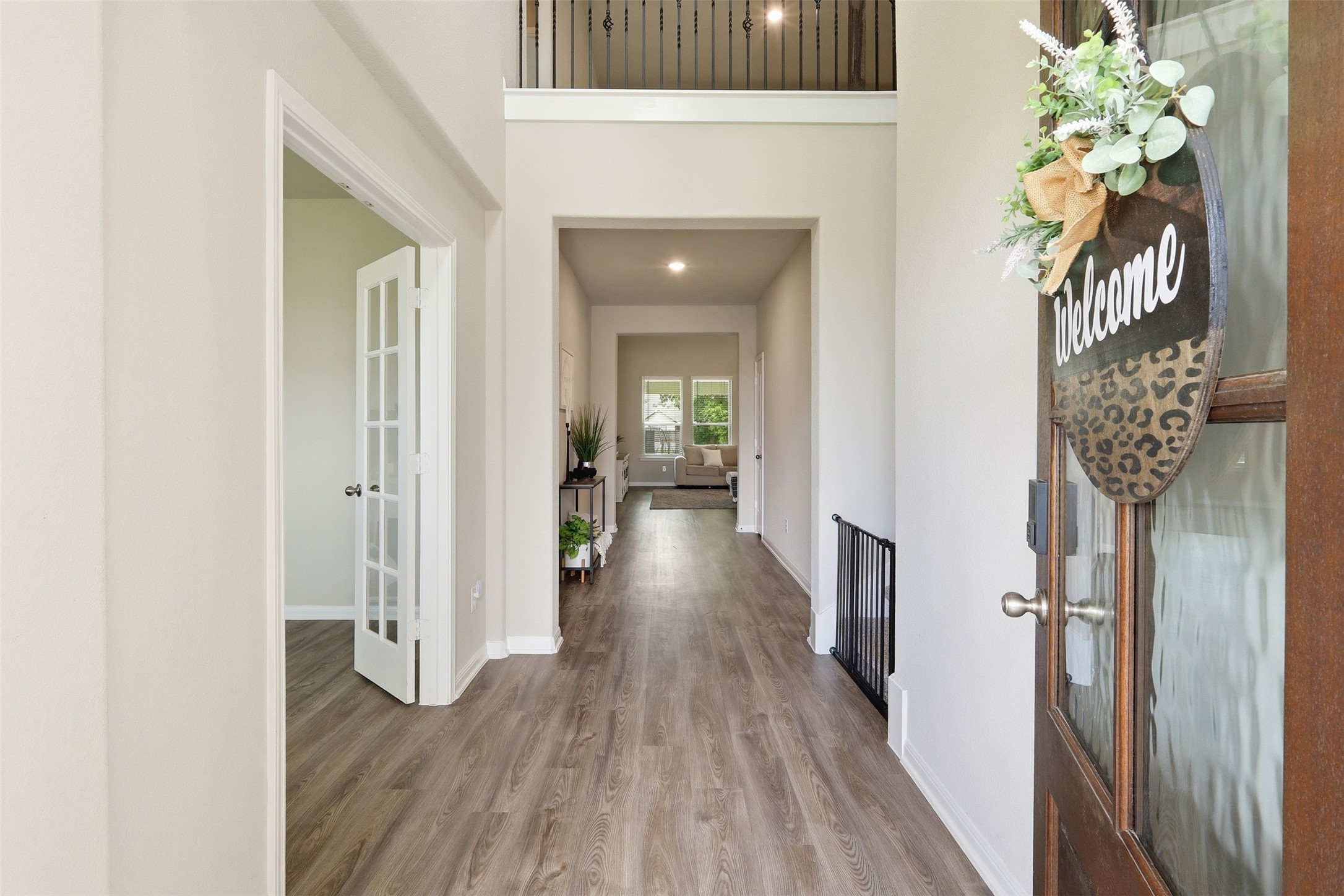 Grand first impression! Bright, welcoming entry with soaring ceilings and an open, inviting foyer.