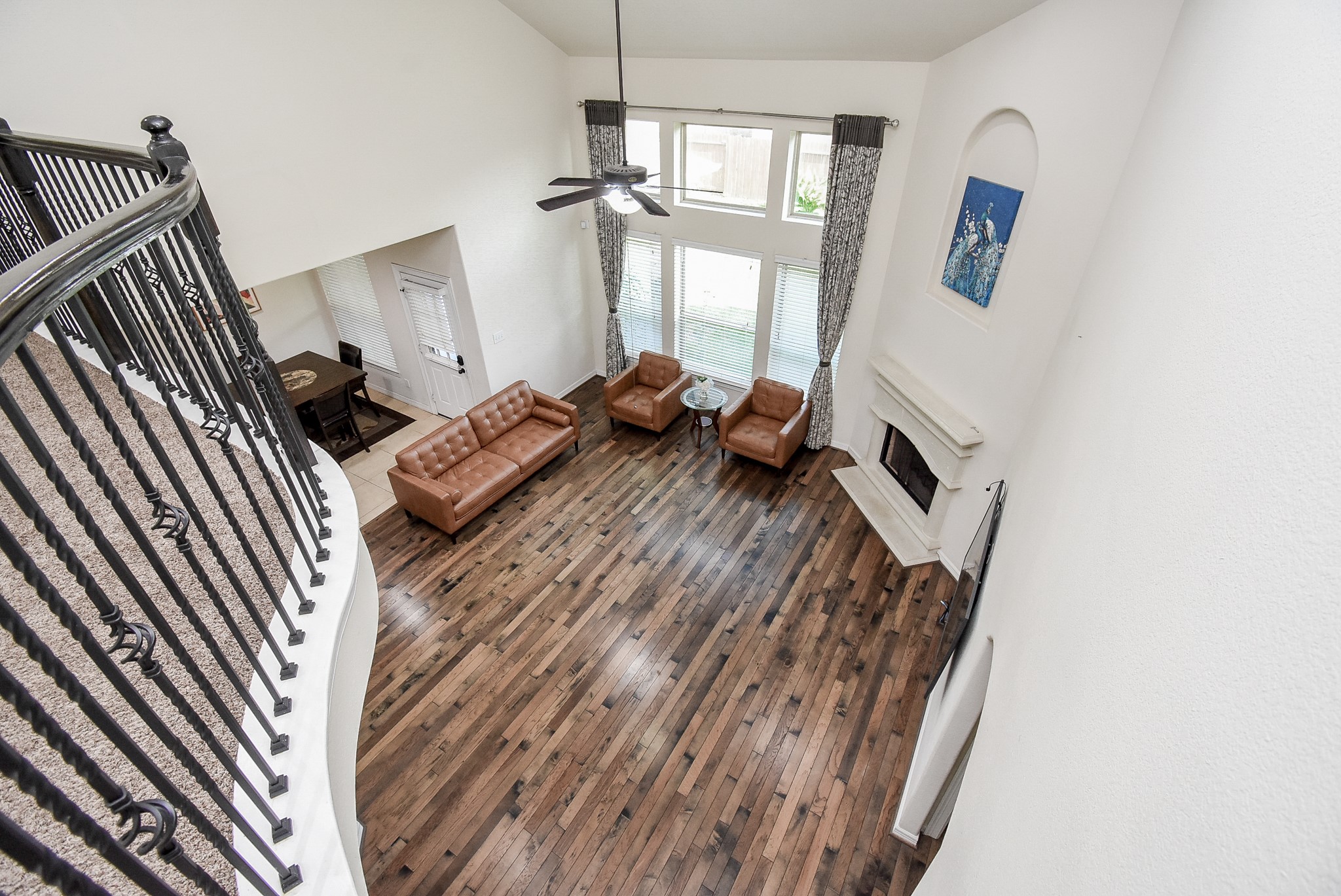 View from the upstairs down into the living/breakfast area.