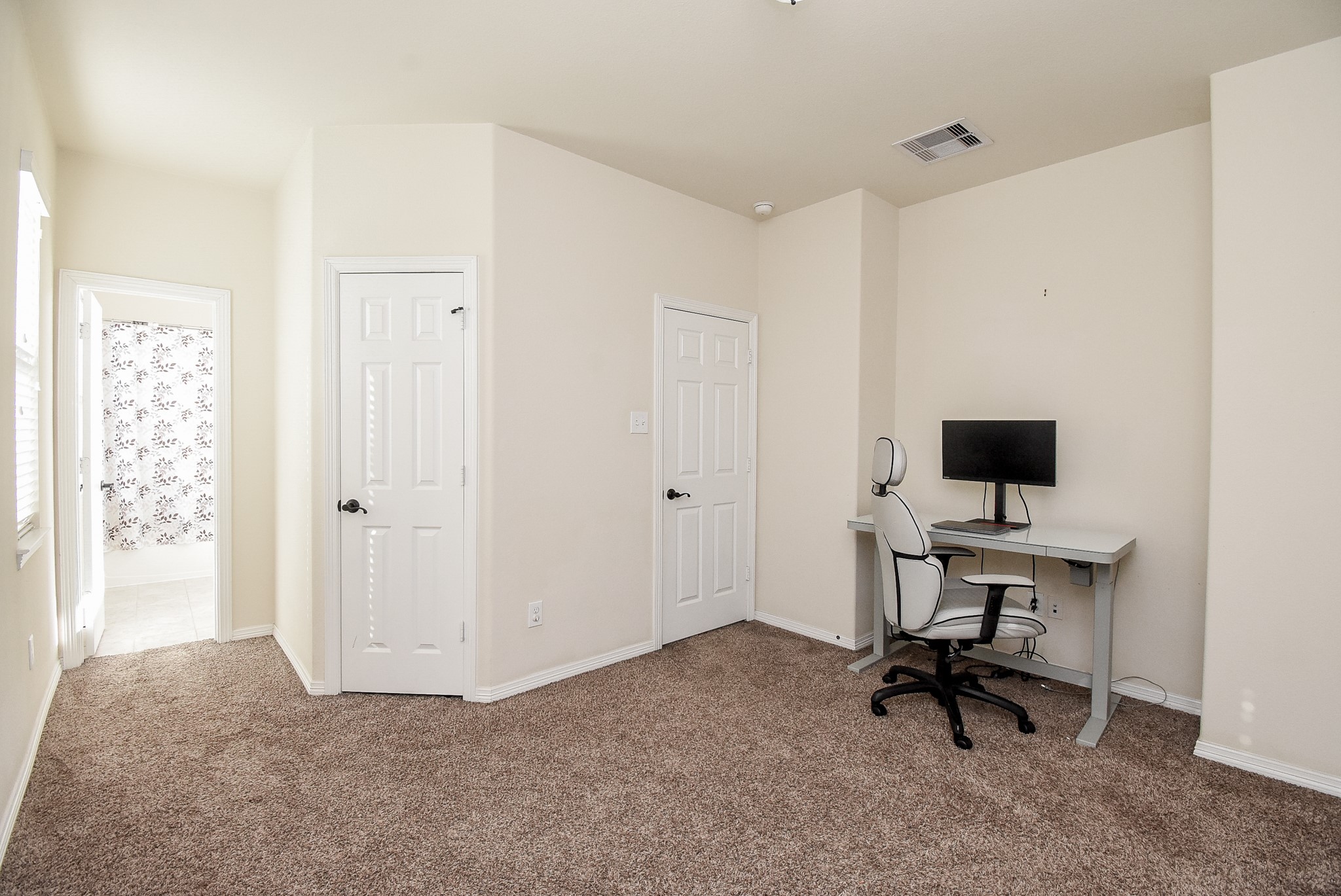 Alternate view of bedroom 3, has it's own ensuite bathroom included a shower/tub combo!