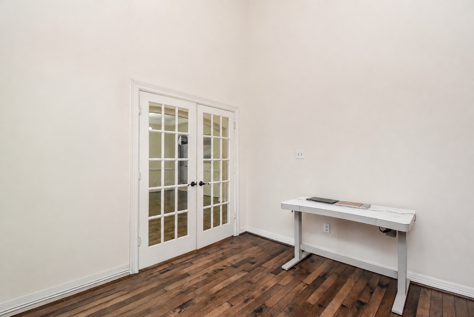 To the immediate right when you enter is the office/study. This photo is virtually staged.