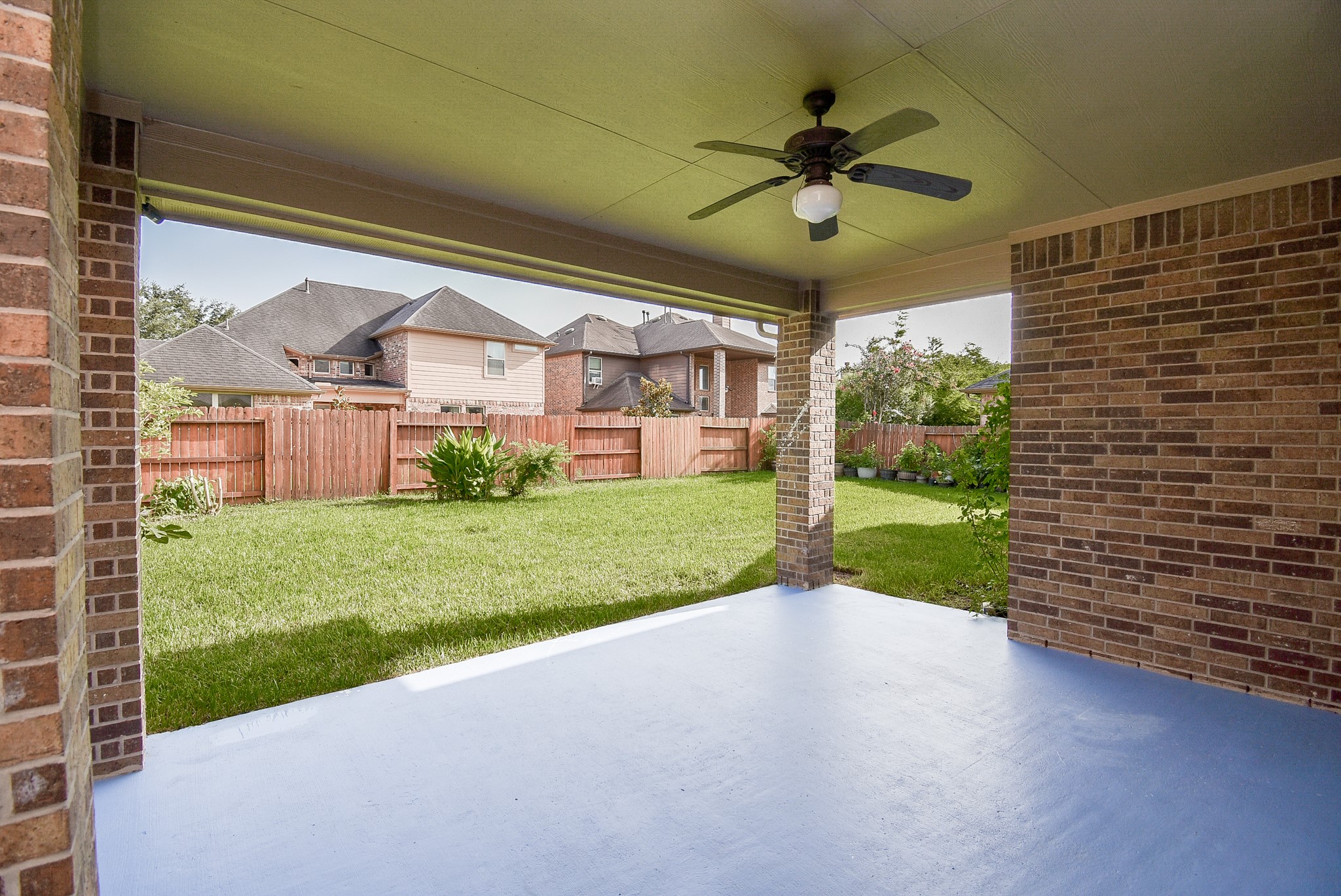 Extended covered patio, fan is already installed so you can relax and enjoy the outdoors!