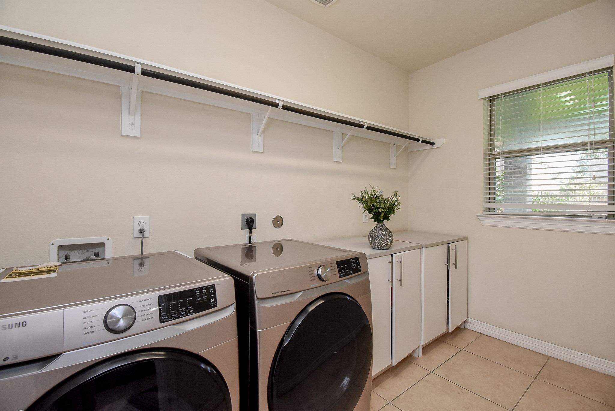 Fantastic sized laundry room located in the house!