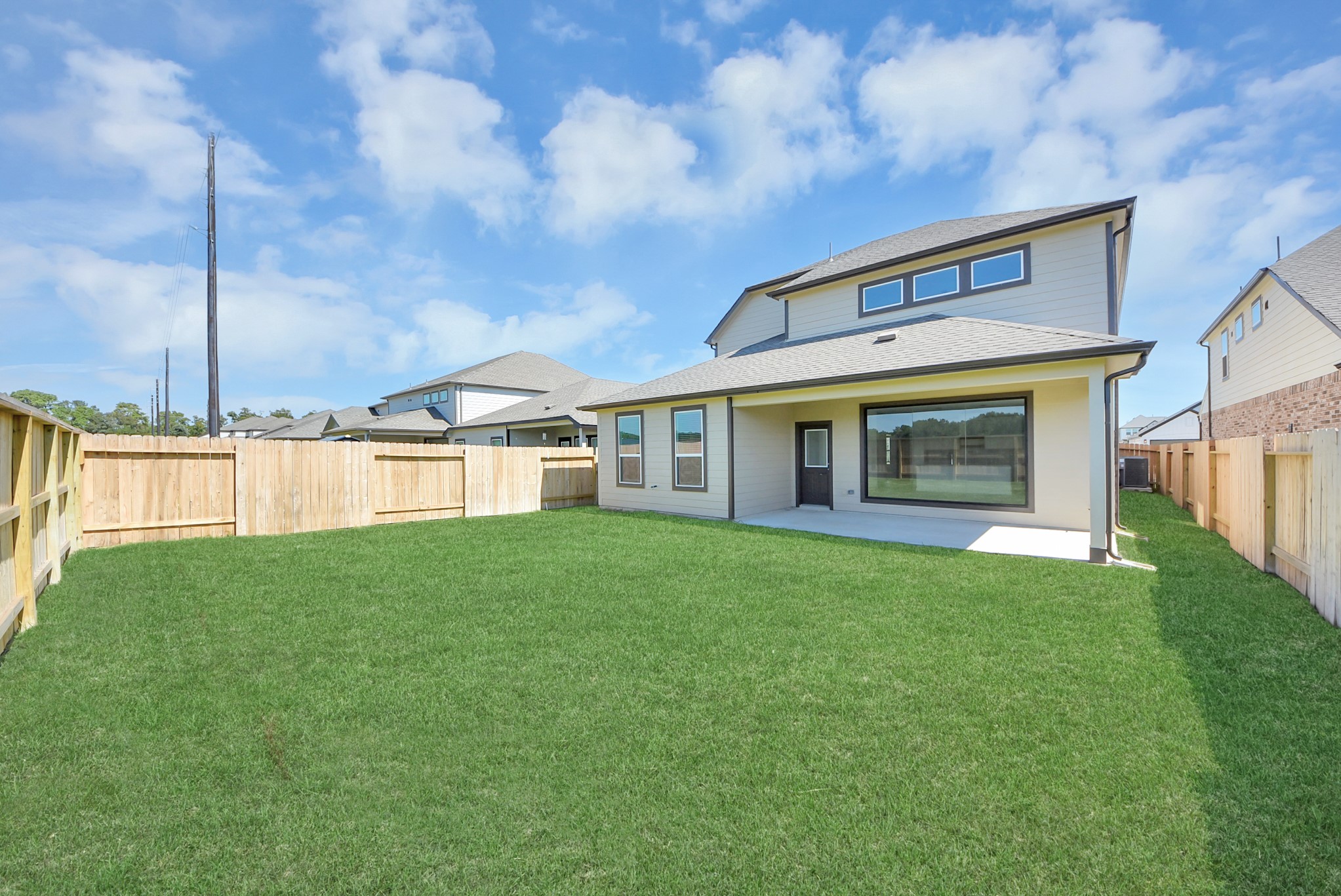 Backyard retreat, offering an abundance of space for kids to play and explore. The possibilities are endless in this outdoor haven, where the joy of open-air activities and family gatherings awaits.