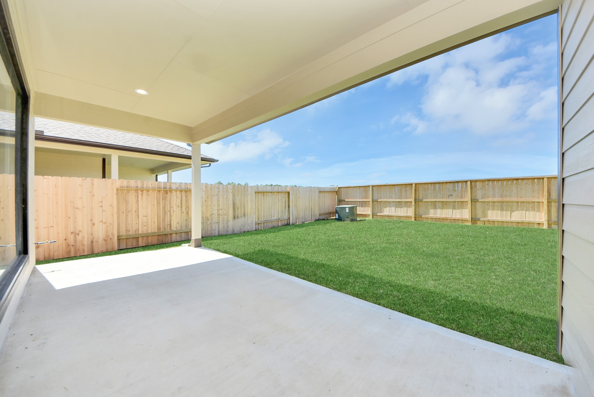 Explore the expansive backyard with its inviting covered patioa perfect blend of space for the kids to play and adults to unwind. Ideal for creating your outdoor oasis, this backyard accommodates patio furniture, a BBQ pit, and endless possibilities for leisure and entertainment.