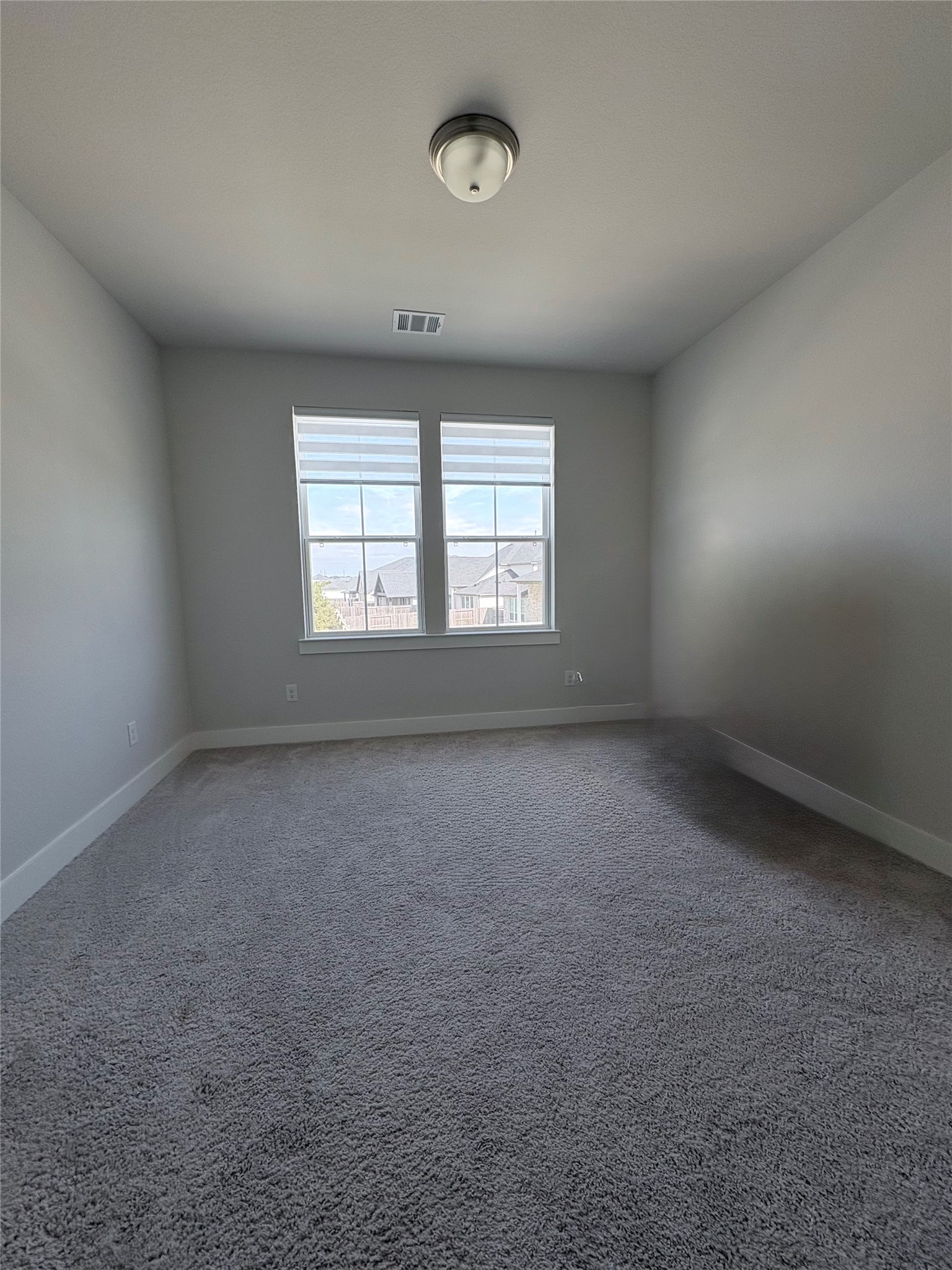 5th Bedroom upstairs! This flex room can be used as a home office/media room or a bedroom.