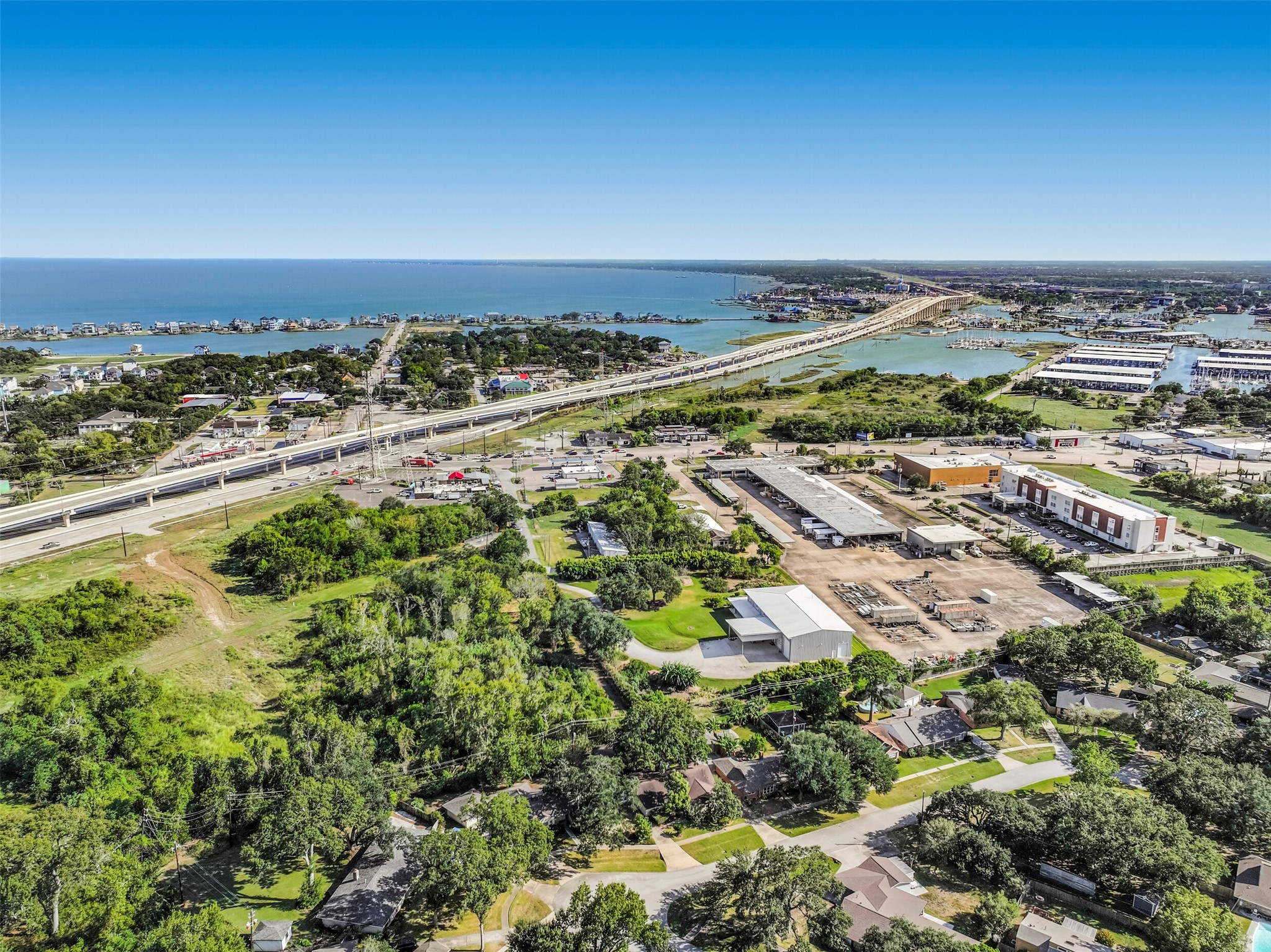 This aerial view helps you see the proximity to Hwy 146 to the left.  The Kemah Boardwalk is shown in the upper right hand corner