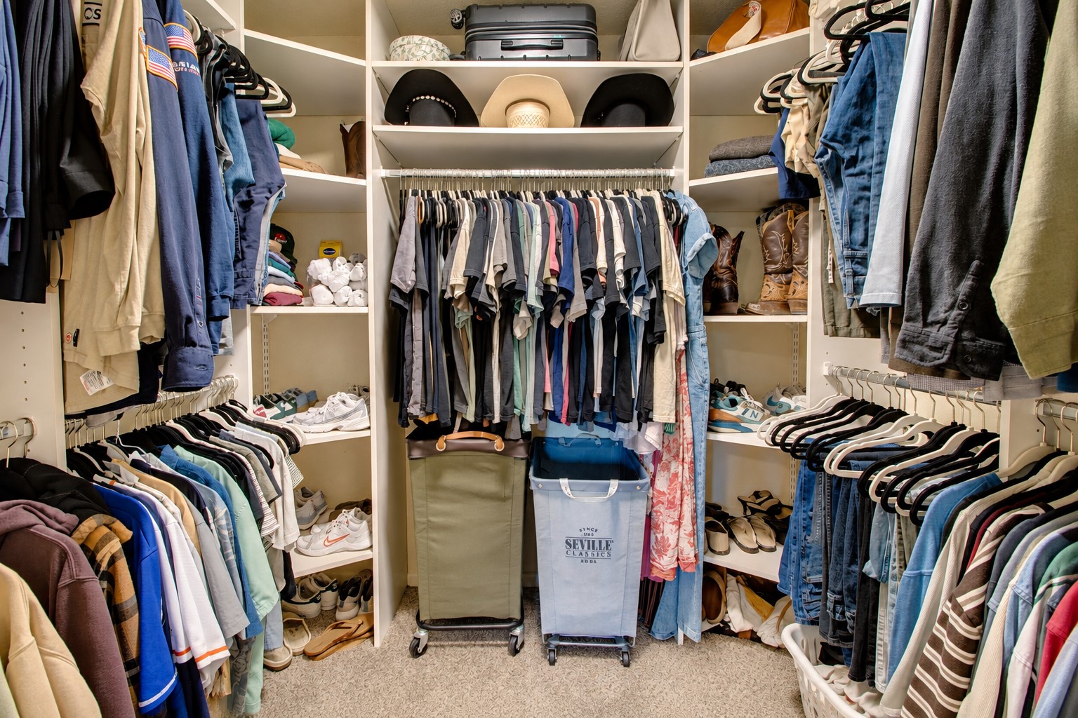 This primary bedroom closet just adds to the storage that is already abundant in this home!