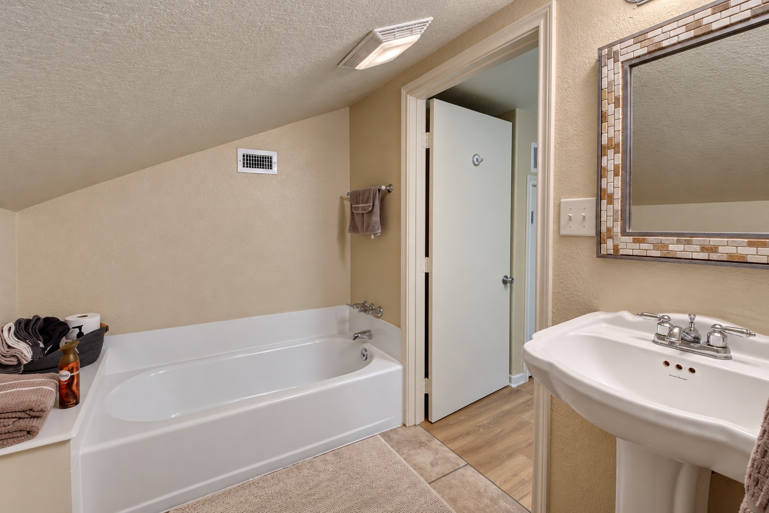 The upstairs ALSO has its own FULL bathroom. Great for multigenerational living.