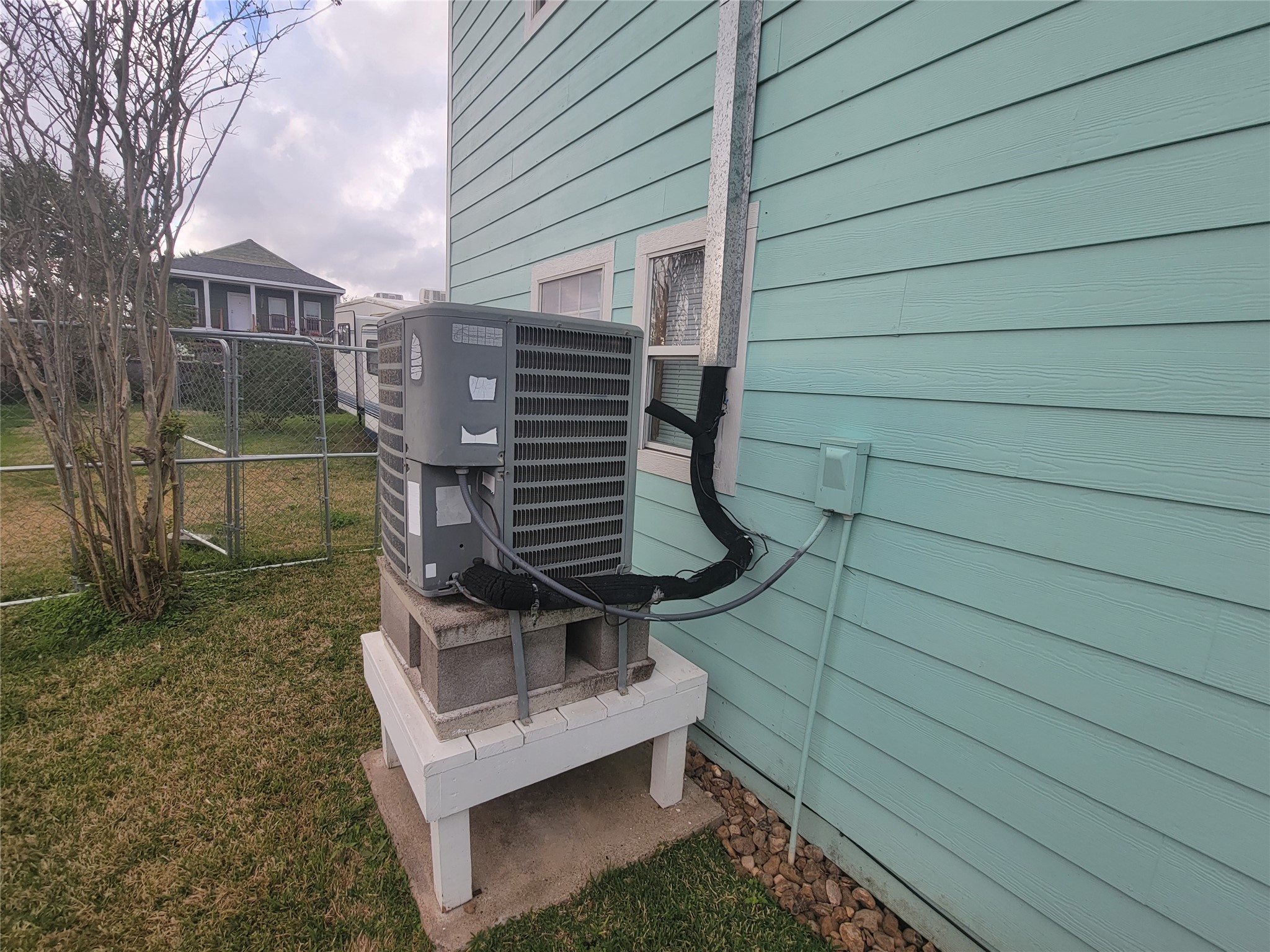 Outside AC unit for upstairs Outside AC unit for upstairs