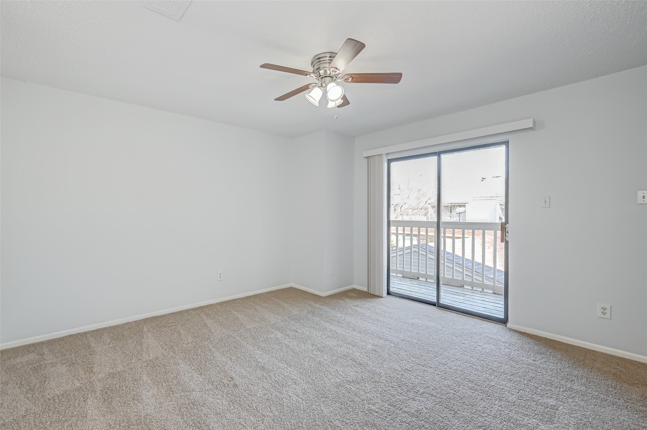 Bedroom with balcony access