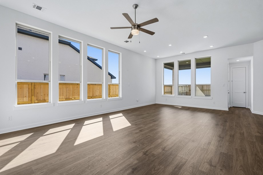 Dining is open to family room with tons of windows for natural light.