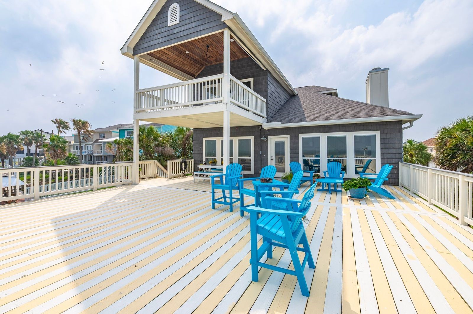 Step outside to expansive waterfront decks where morning coffee is paired with tranquil sunrises and evenings end with spectacular coastal sunsets.