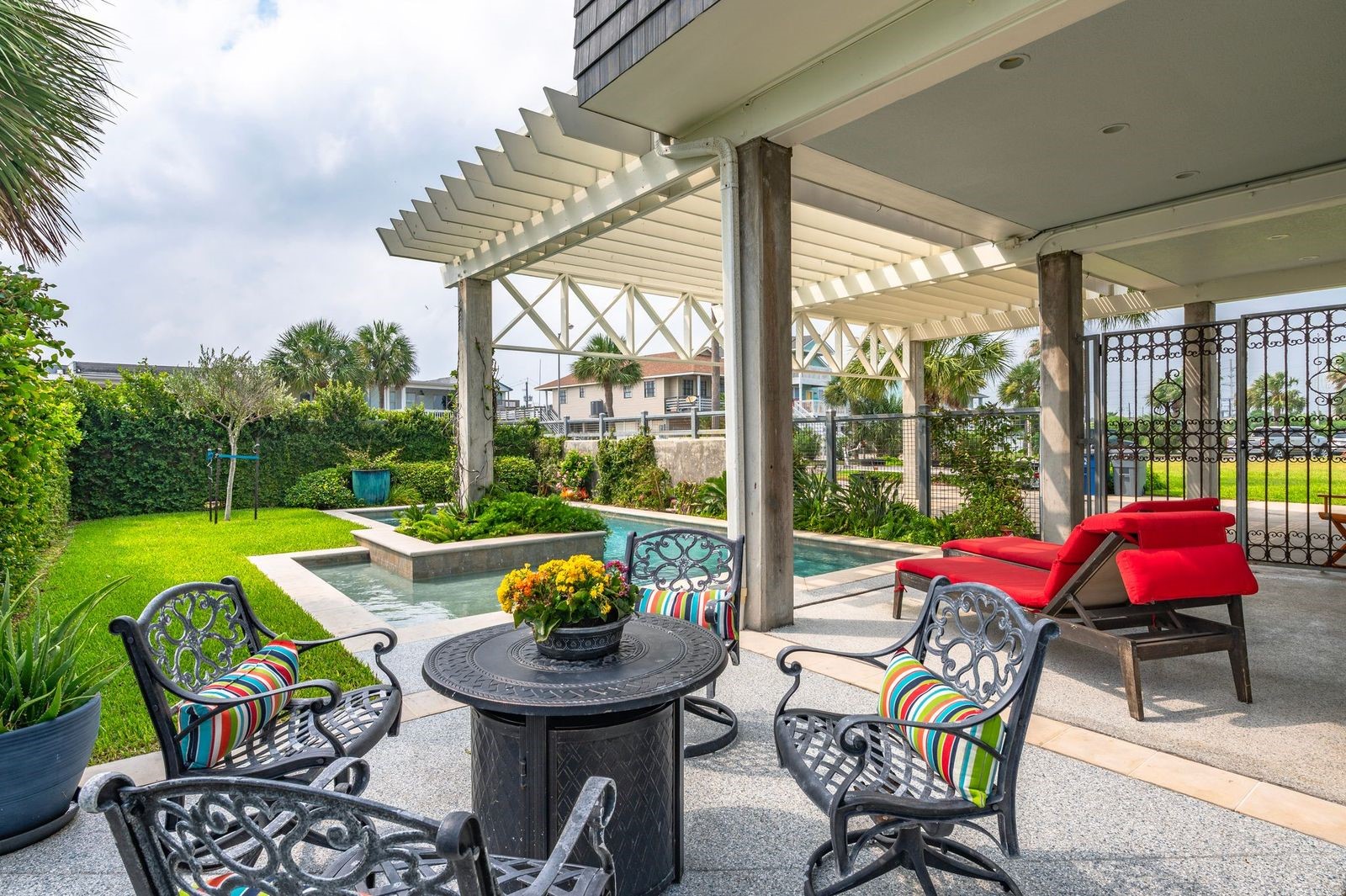 The Lifestyle You Have Dreamed About!  Fully fenced private yard with swimming pool, wrought gate and extended patio space.