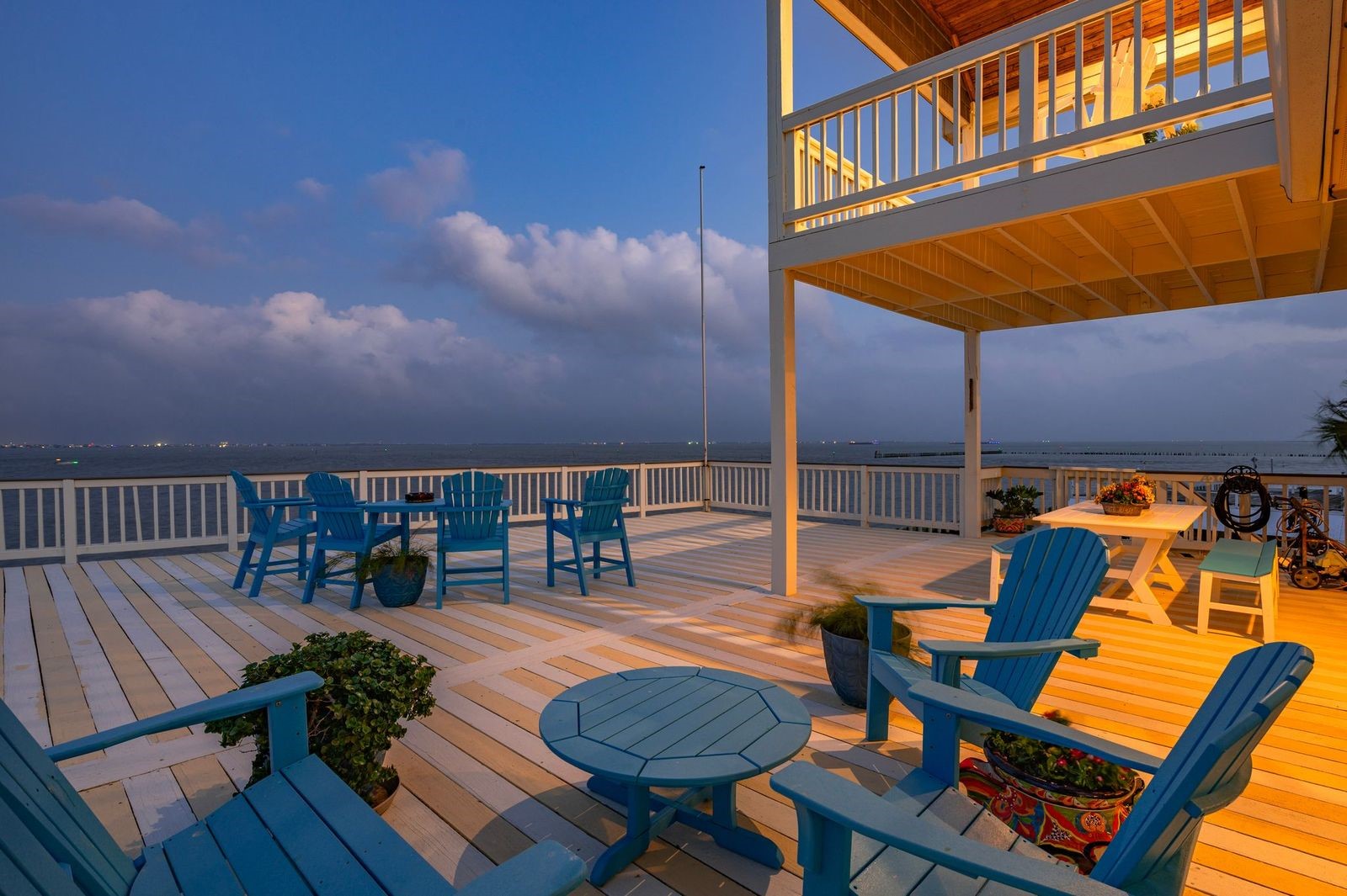 Designed with entertaining in mind, the extended outdoor patio and upper deck provide breathtaking views of Galveston Bay. Designed with entertaining in mind, the extended outdoor patio and upper deck provide breathtaking views of Galveston Bay.