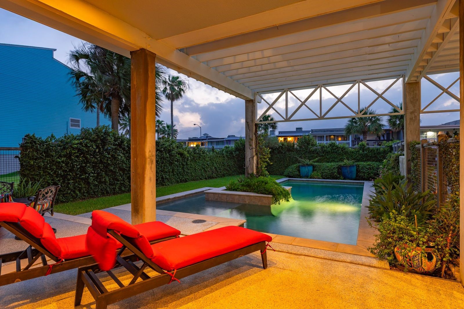 Private Pool with Tranquil Setting!  Fenced yard with extensive decking, covered patio and exterior lighting.