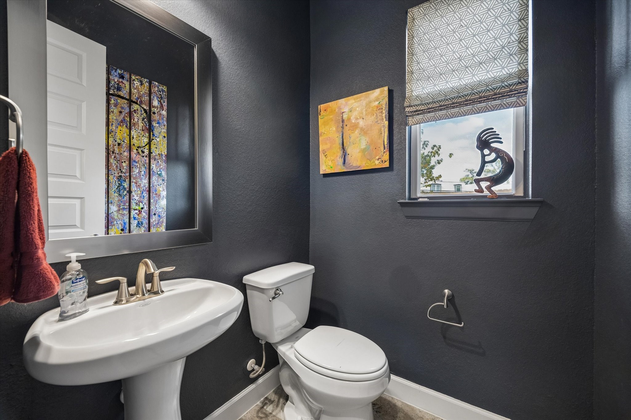 Elegant guest bathroom off entry hall.