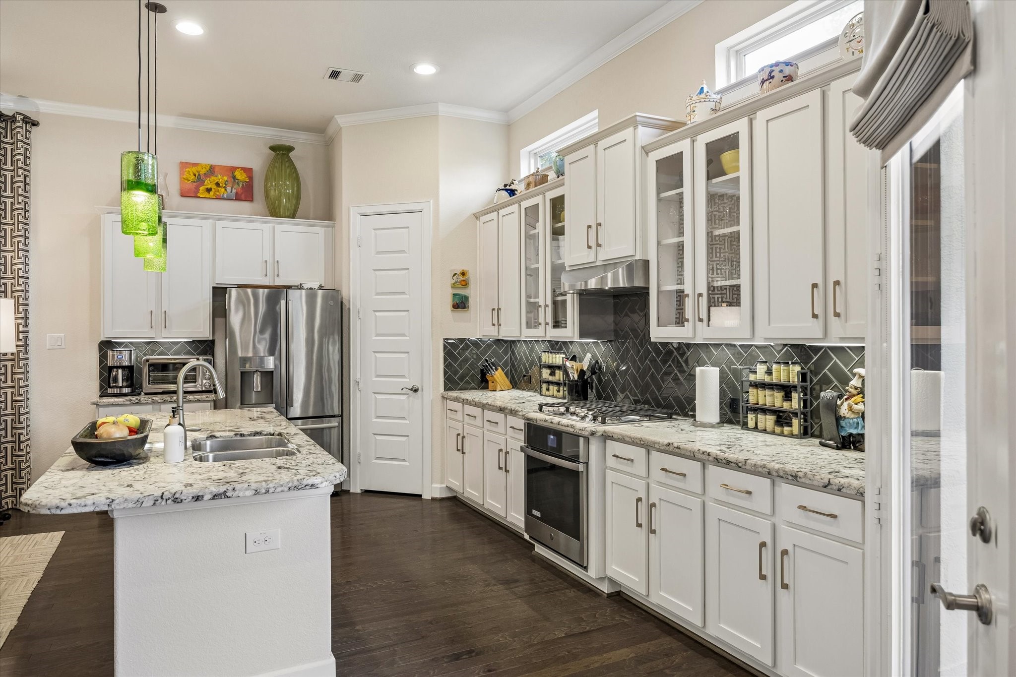 Open kitchen. Step in pantry and good counter space