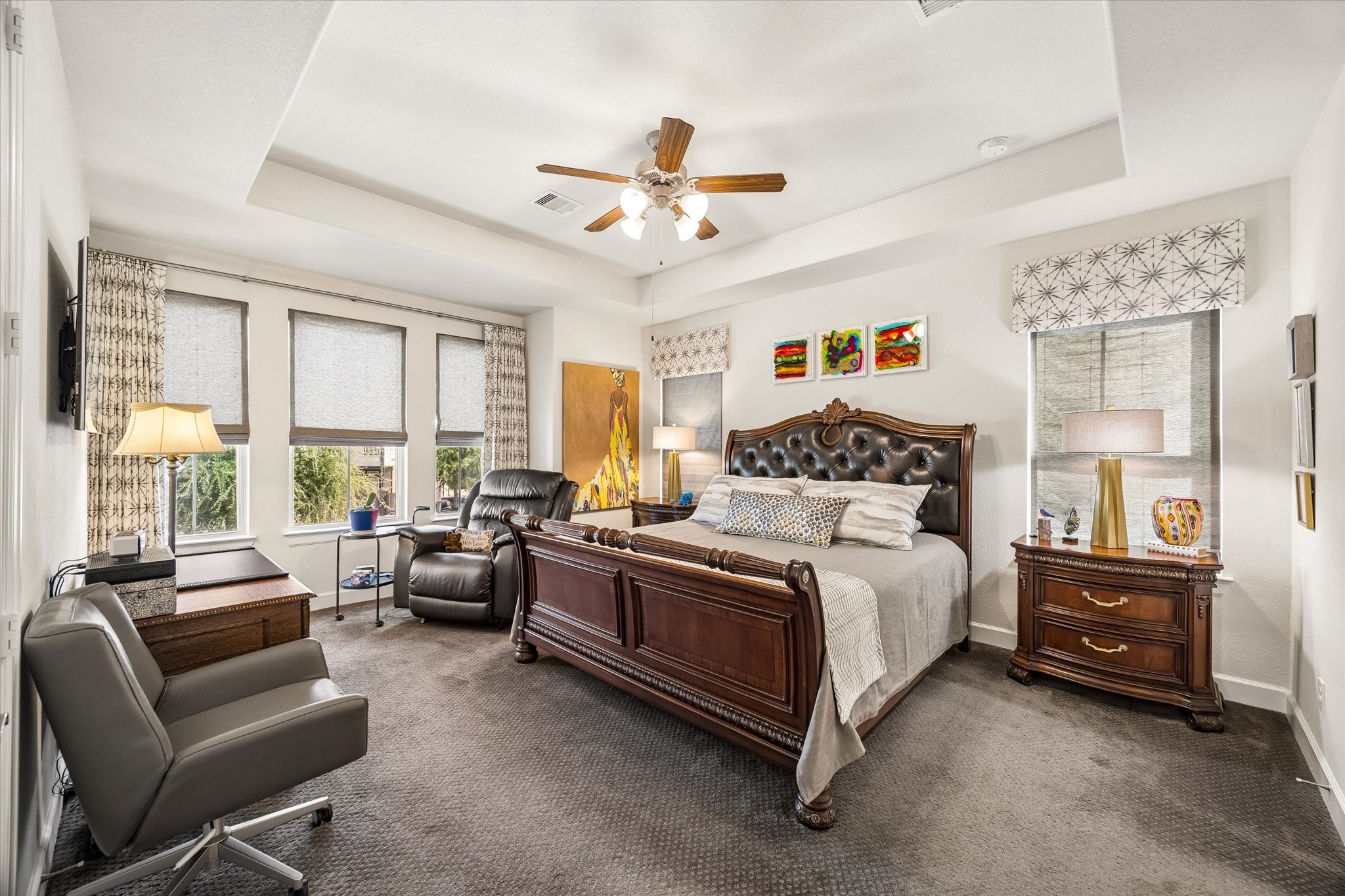 Majestic primary bedroom w/en-suite bathroom.