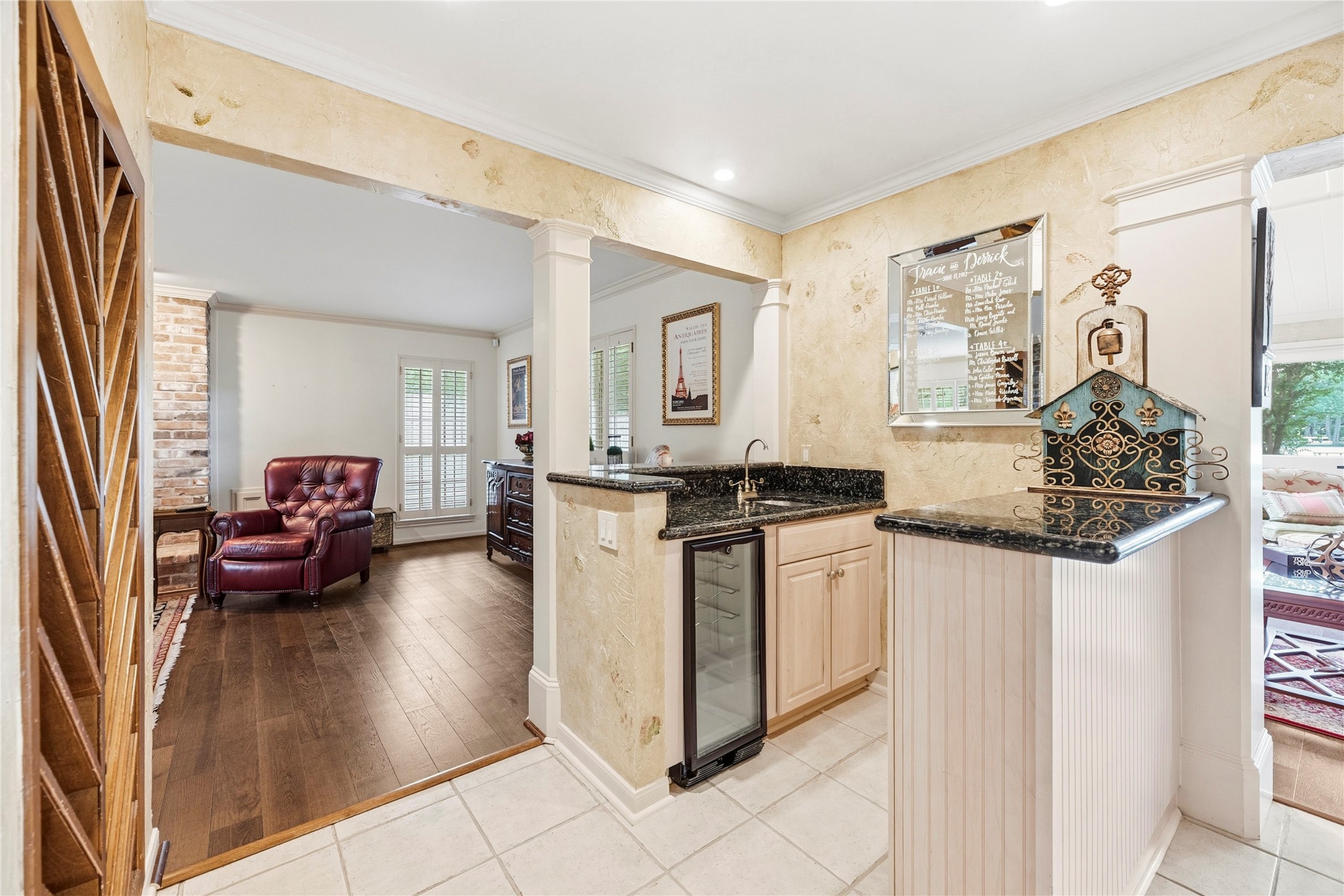 Wet bar connecting the kitchen area to the den.