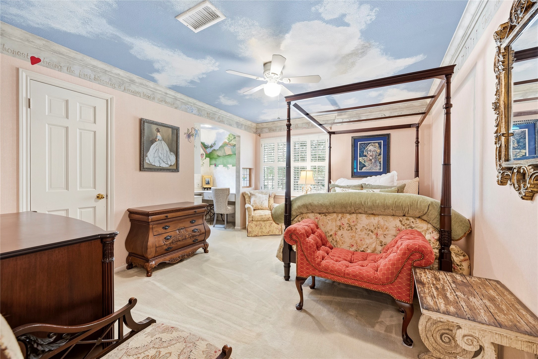Charming secondary bedroom with plush carpet, large closet, and a bonus nook.