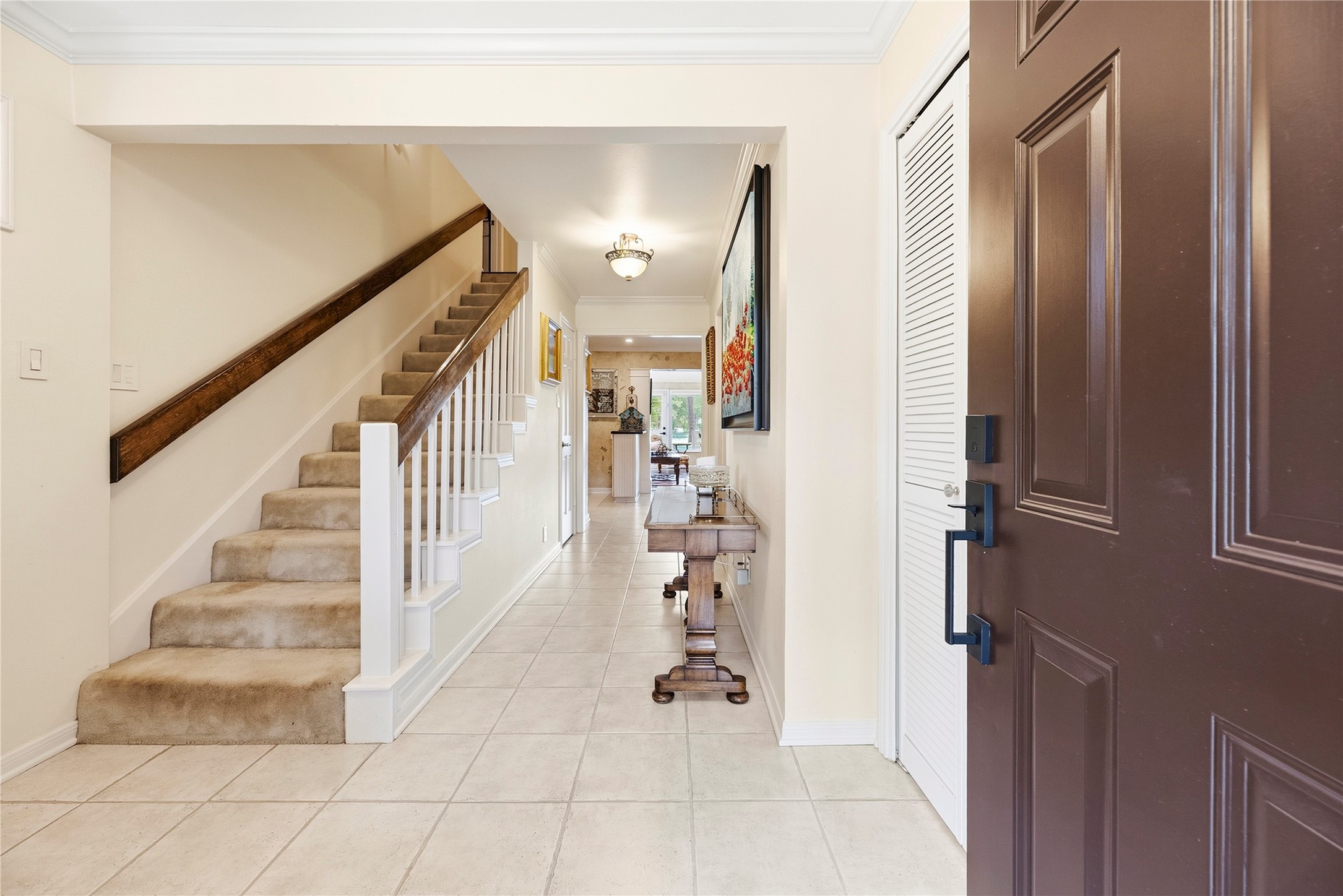 Welcome home! One of Two staircases greet you.