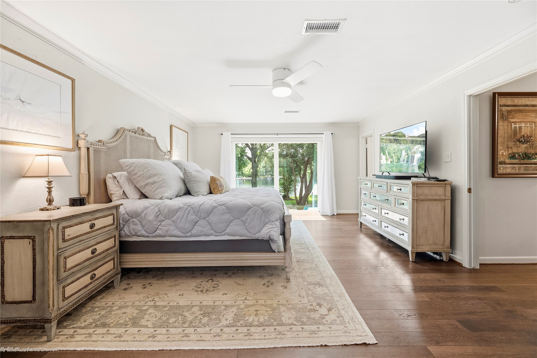 Welcome to your primary suite retreat, split closets, neutral paint, beautiful wood floors.