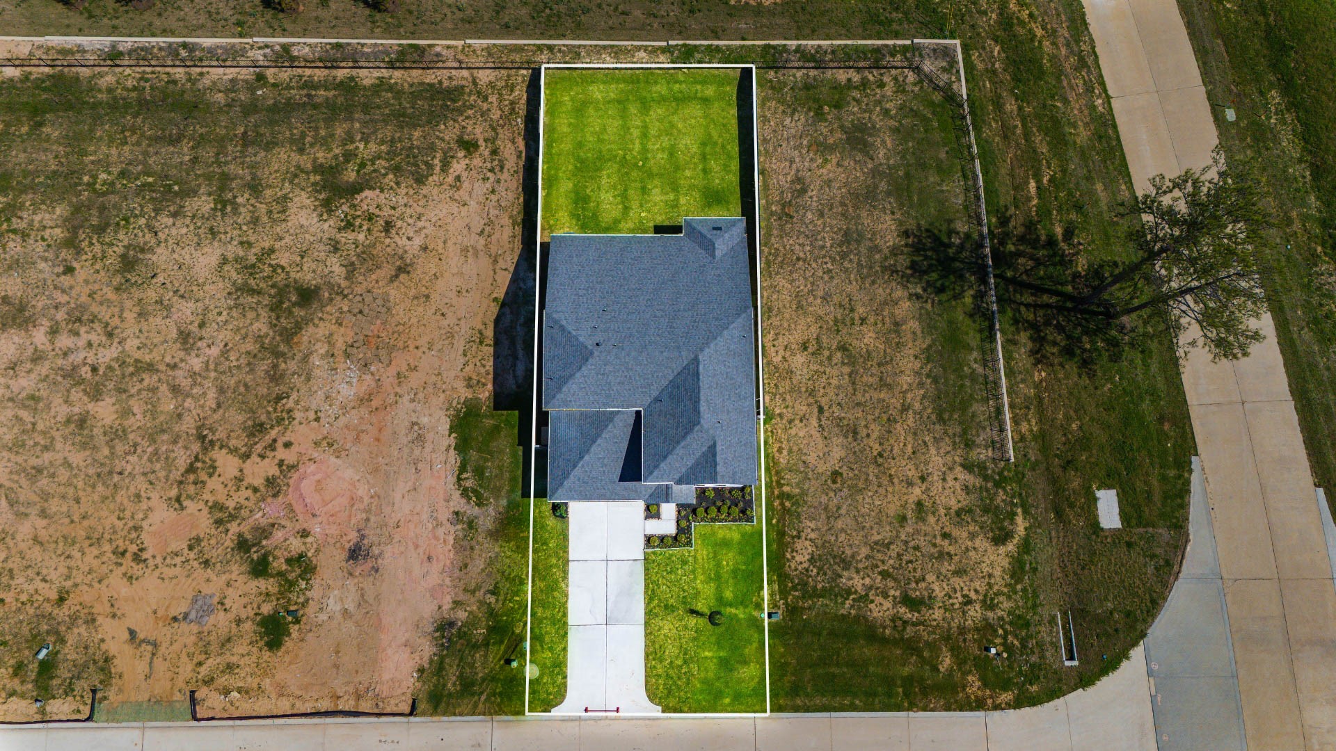 This home sits on a large lot with ample yard space in front and the back, lush landscaping and well-maintained yard!