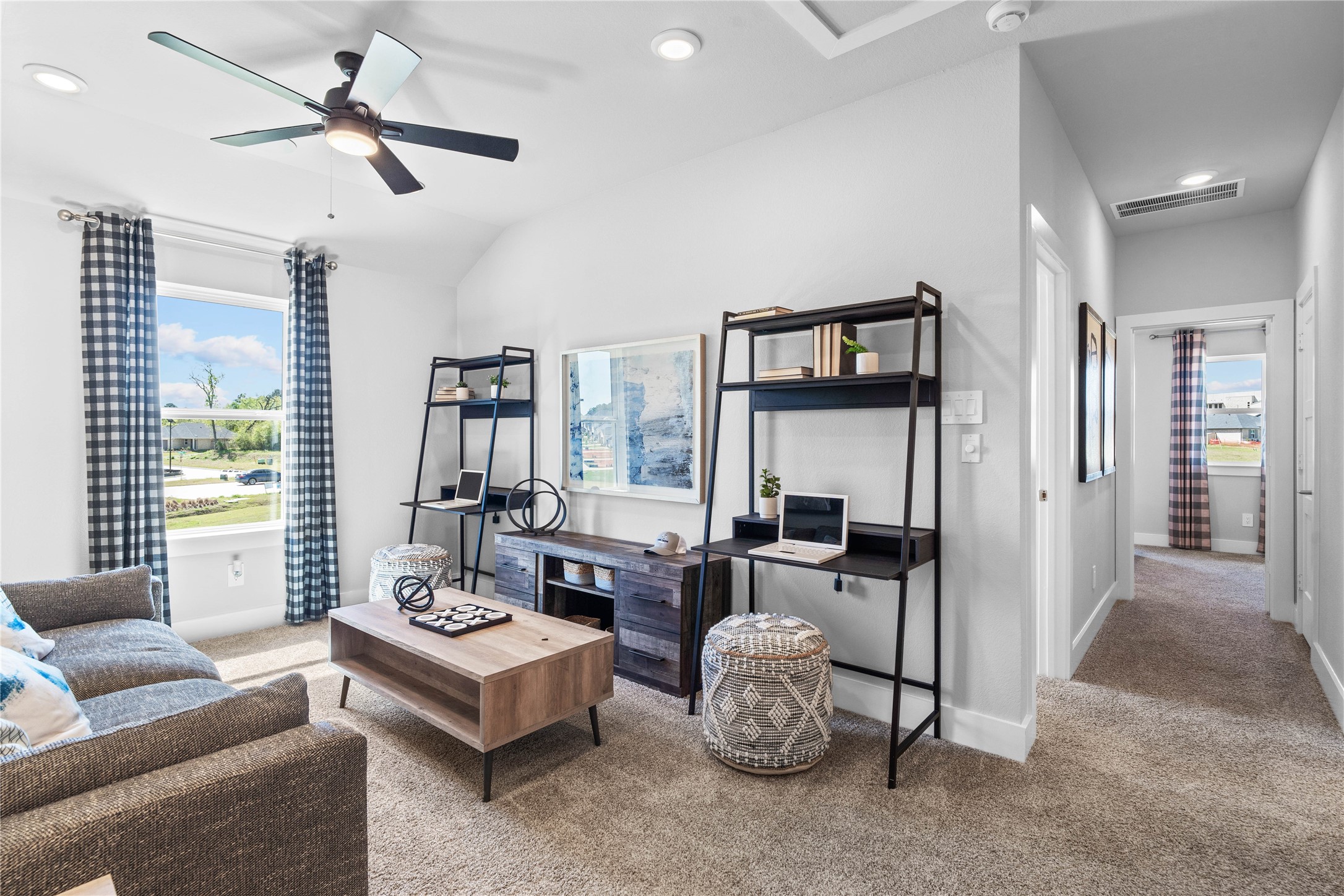 Ascend to this versatile second-floor Game Room! This spacious, bright and inviting room provides abundant natural light. It offers endless possibilitiesenvision a cozy media room, a vibrant play area, or a quiet reading nookadapting easily to the buyer's needs.